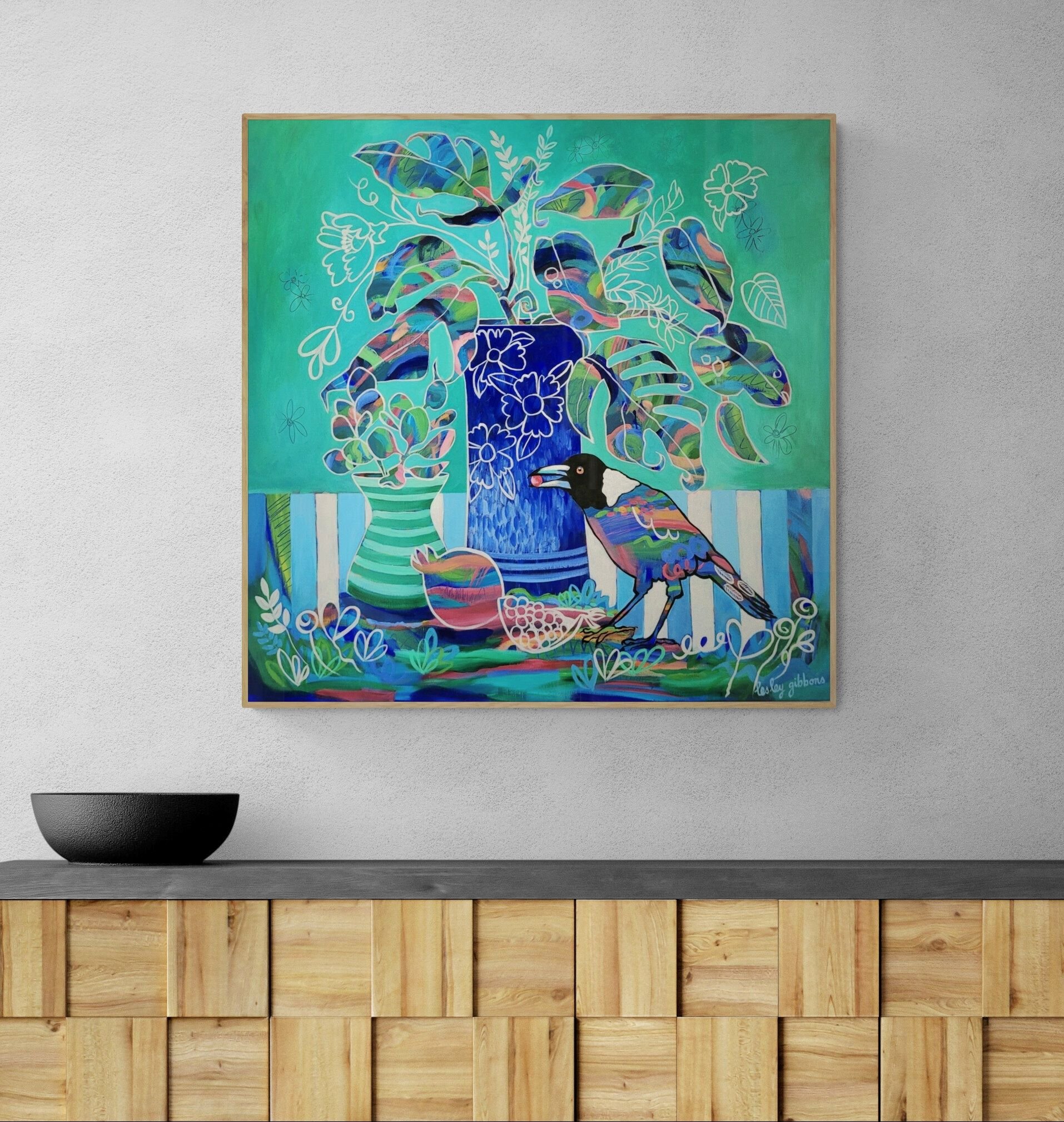 V2 Green and blue painting of magpie on table with Plant_in_black_vase_sitting_on_modern_cabinet.jpg