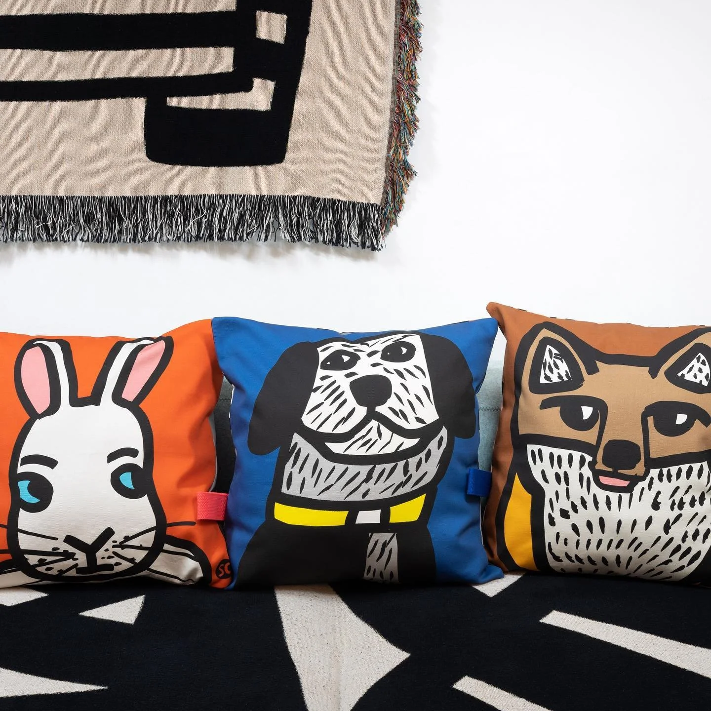 A rabbit, a dog and a fox are waiting for you at the #tuigmarkt this Sunday @blikfabriek @tuig.rocks! I will show a very limited edition in textile! #limitededition #pillows #toiletbag #sarahcorynen #printedtextiles #feelgoodbags #travelpouch #blikfa