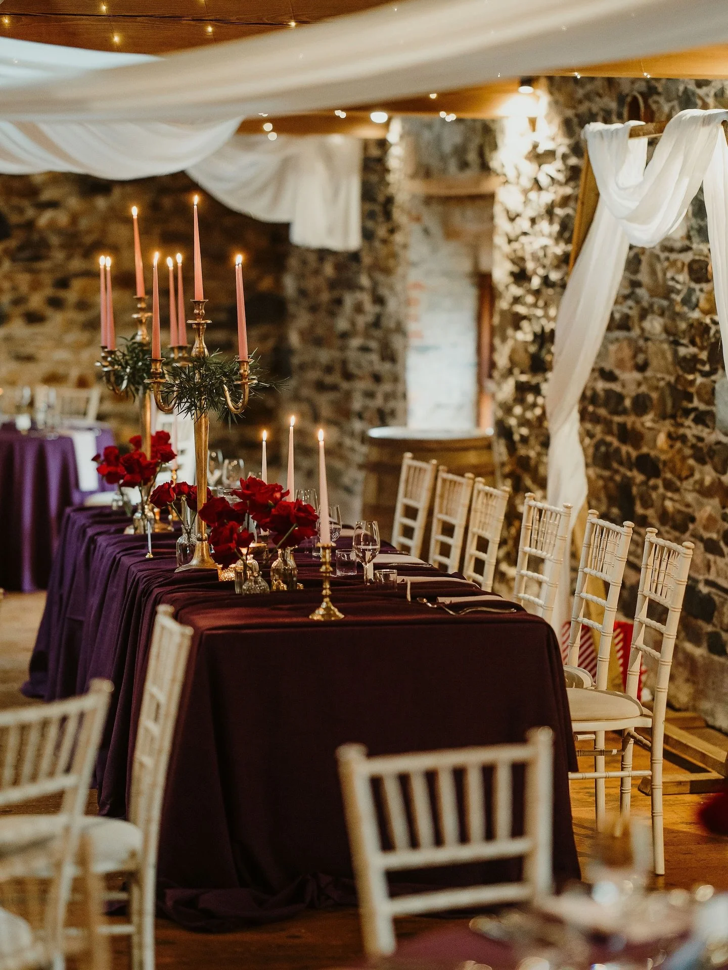 Candlelight and jewel tones creating atmosphere that&rsquo;s felt, not just seen, for E &amp; A&rsquo;s beautiful December wedding at #lowhallthelakes 

Photography @joematherweddings 
Styling &amp; draping @deborahmariastyling 
Flowers @rockandwreat
