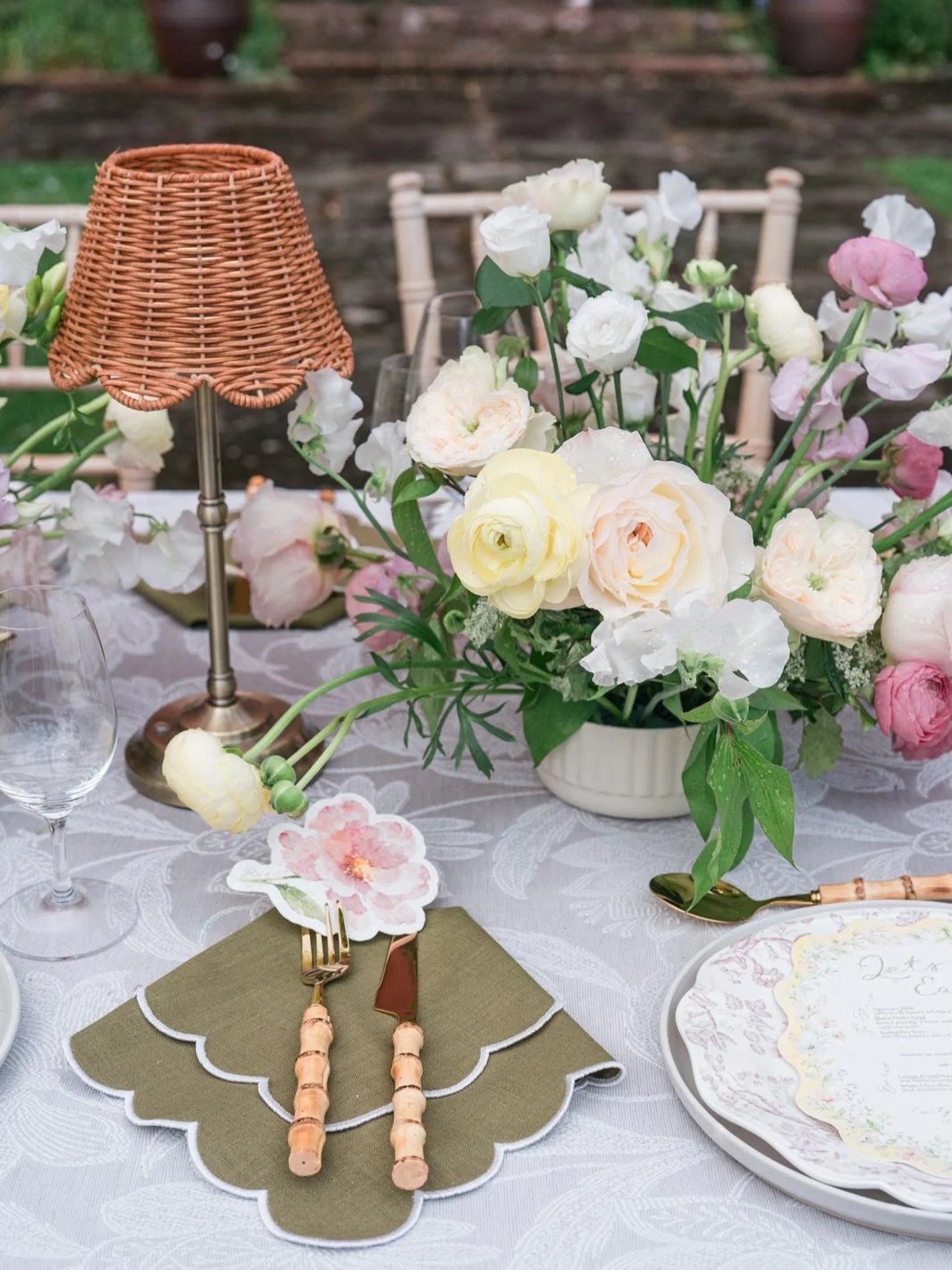 Scalloped edges, rattan light, and a tablecloth made specially for the setting.

The kind of details that quietly shape the atmosphere.

Photography @jennyjonesphotography
Venue @askhamhallweddings
Styling @deborahmariastyling
Florals @roseandbloomfl