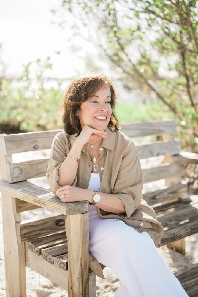 A relaxed outdoor portrait of Helena, capturing her warmth, personality, and beautiful natural smile during our Sarasota photo session.