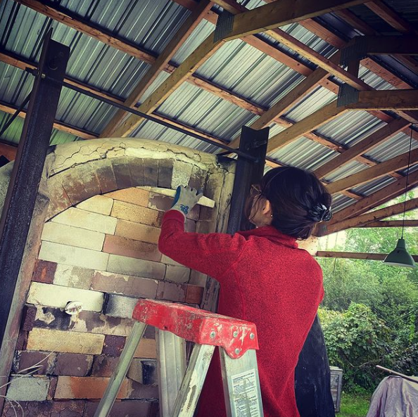 resident-loading-the-wood-kiln_orig.png