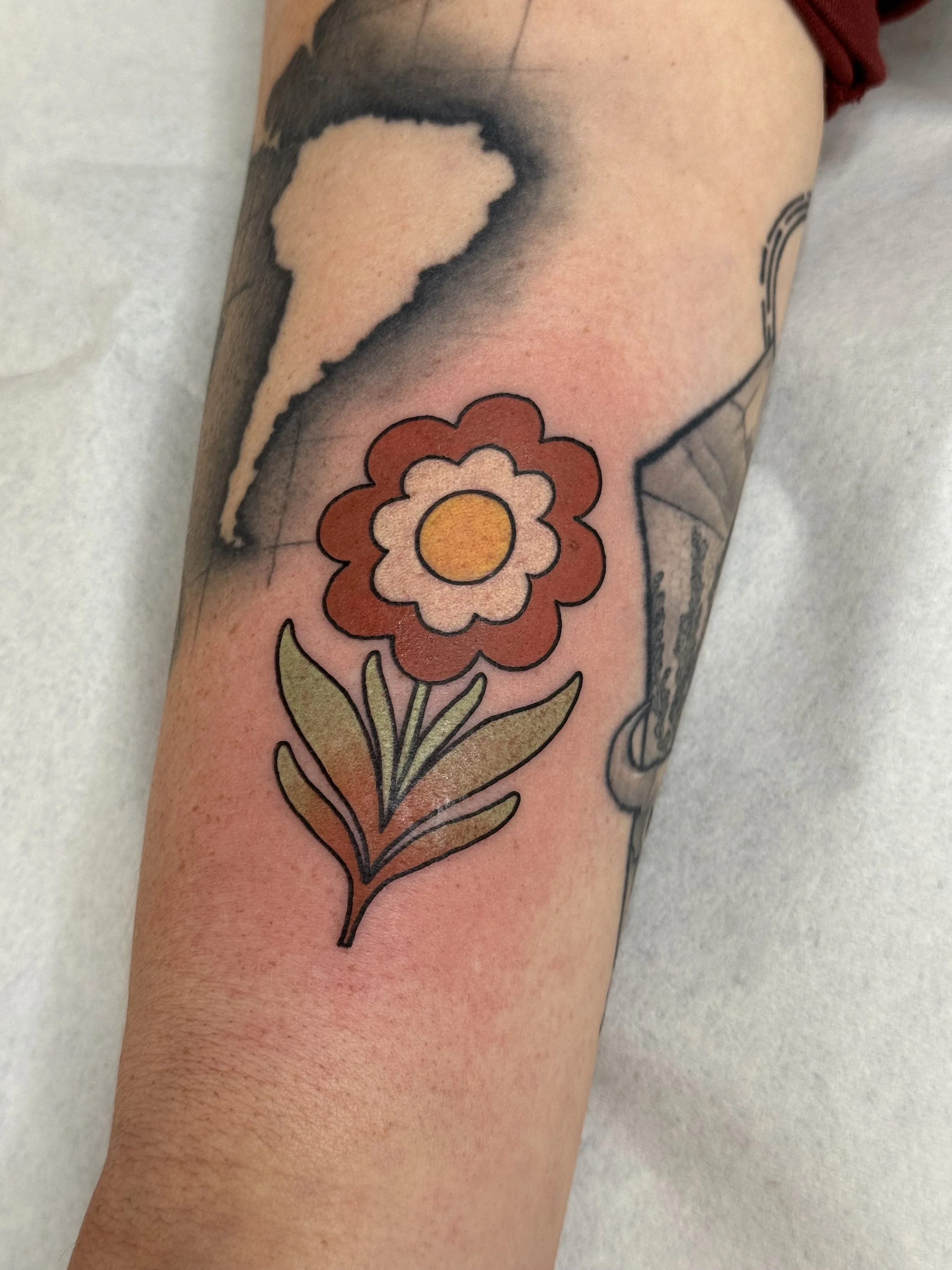 70s inspired pattern flower tattoo design