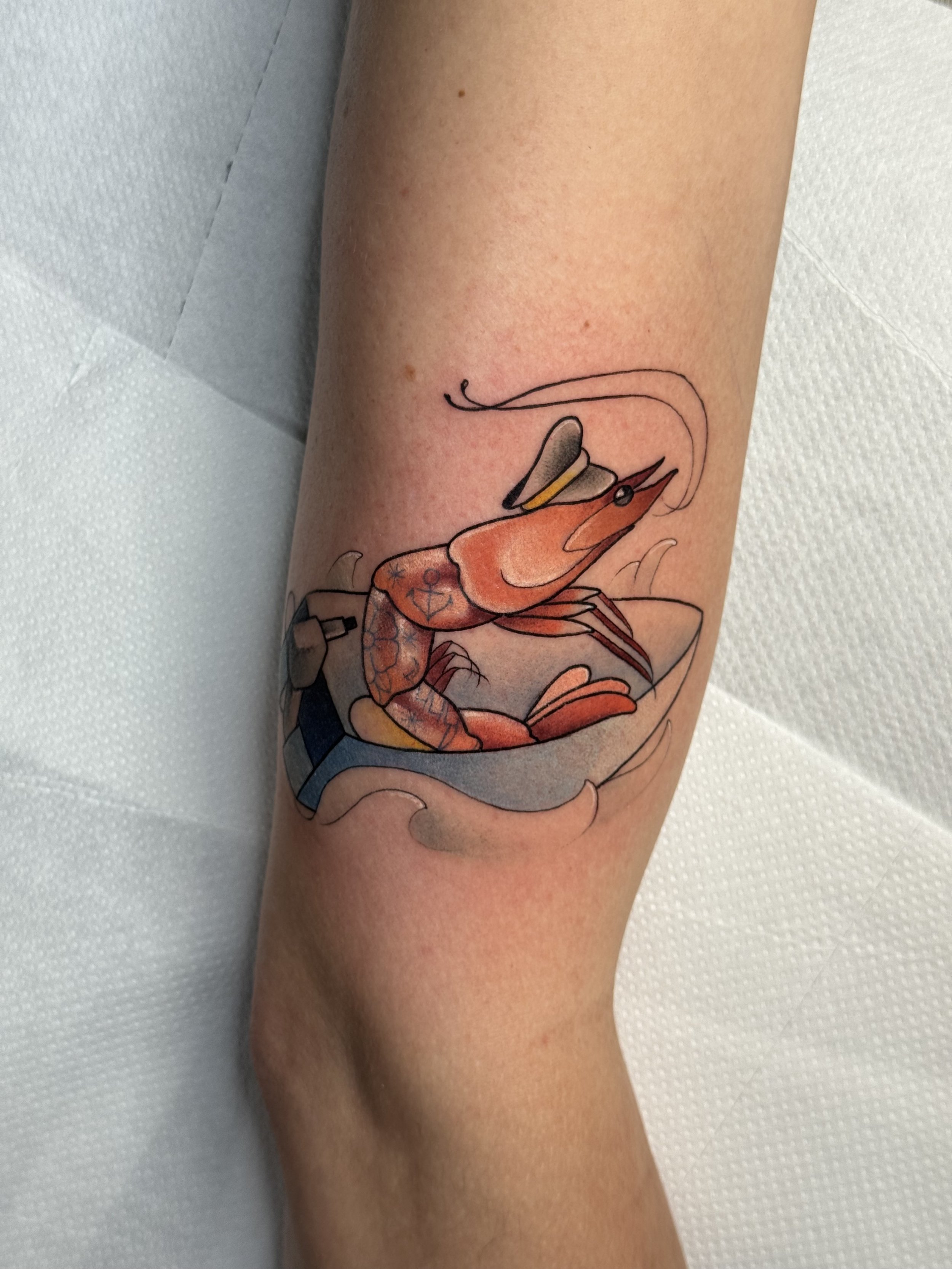 Shrimp on a boat, neotraditional/illustrative color tattoo