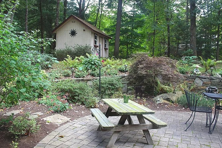 Beautiful patio and back yard of Colonial home in Bristol, CT sold by The Via Domus Team of William Raveis