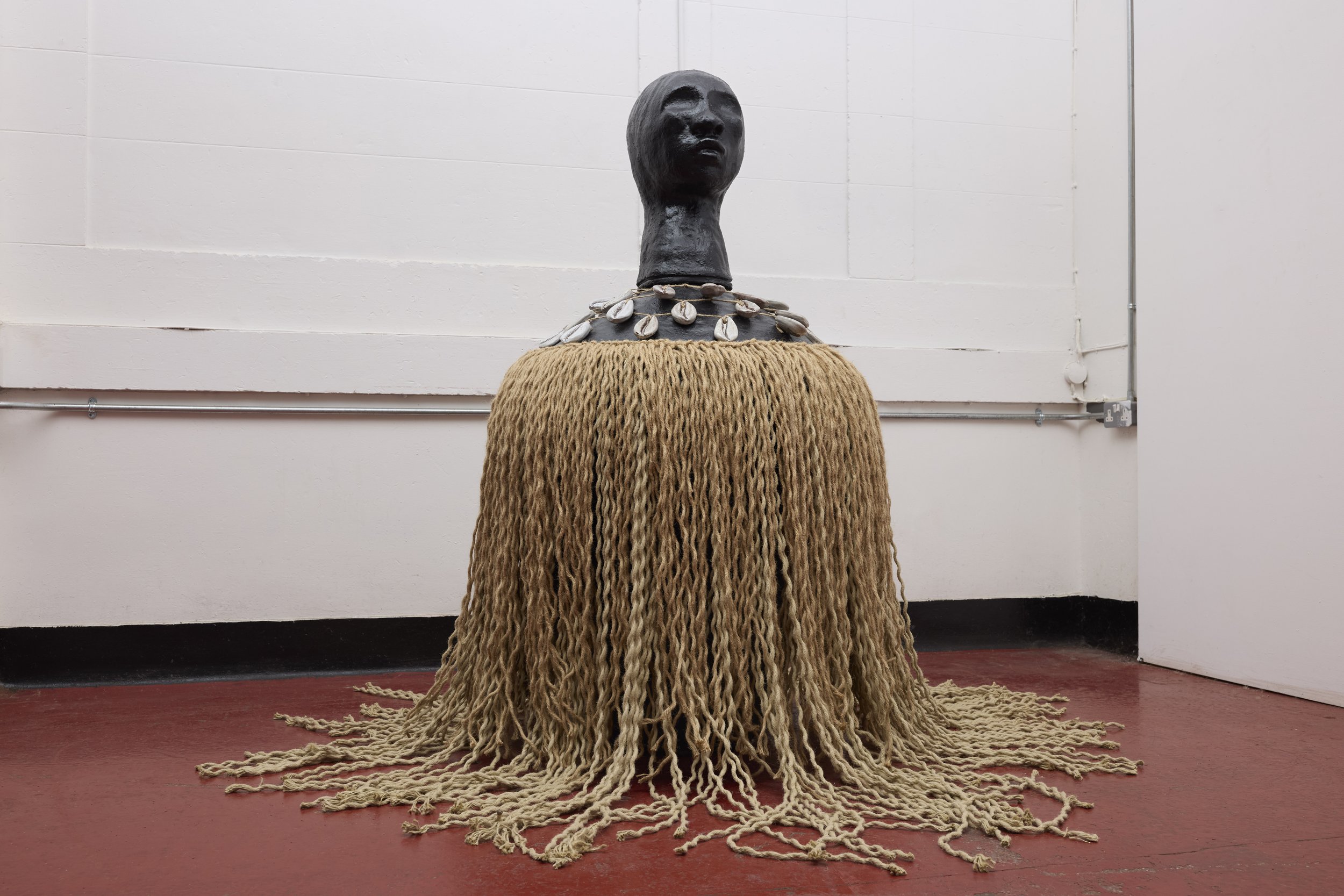 Clay sculpture describing the history of Anarcha