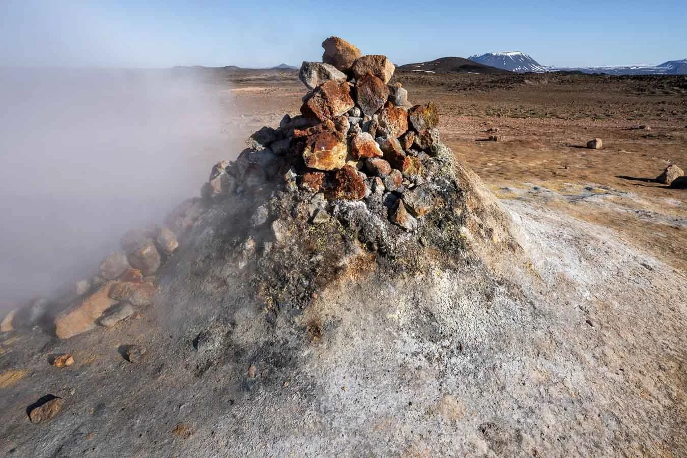  The fumaroles, or ‘smokers’, at  Námafjall  release hot sulfuric steam from deep within the earth, creating an otherworldly atmosphere and a strong geothermal scent. 