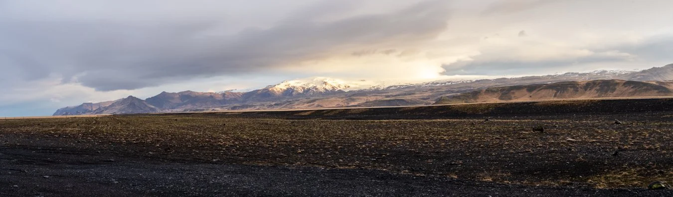 A stunning sunrise over the mountain range along Iceland’s Ring Road in the south, between Skógafoss and Reynisfjara.