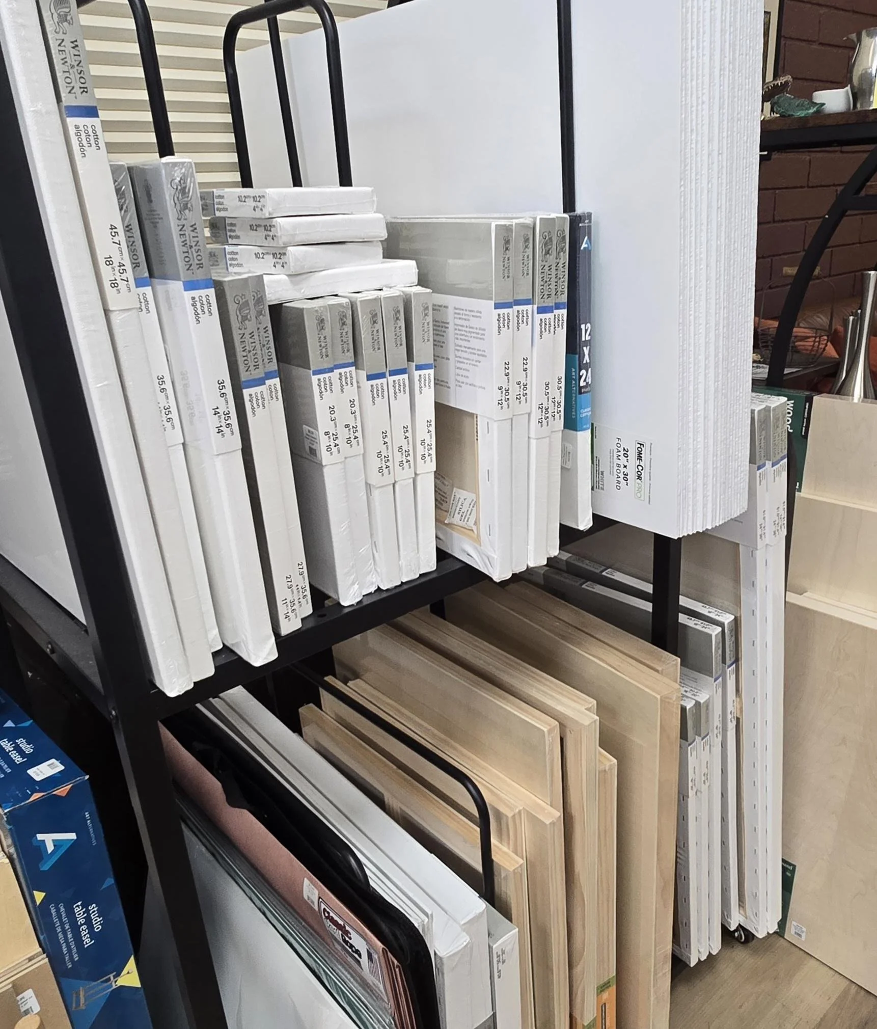 medium to large (up to 24"x36") canvases and wooden panels