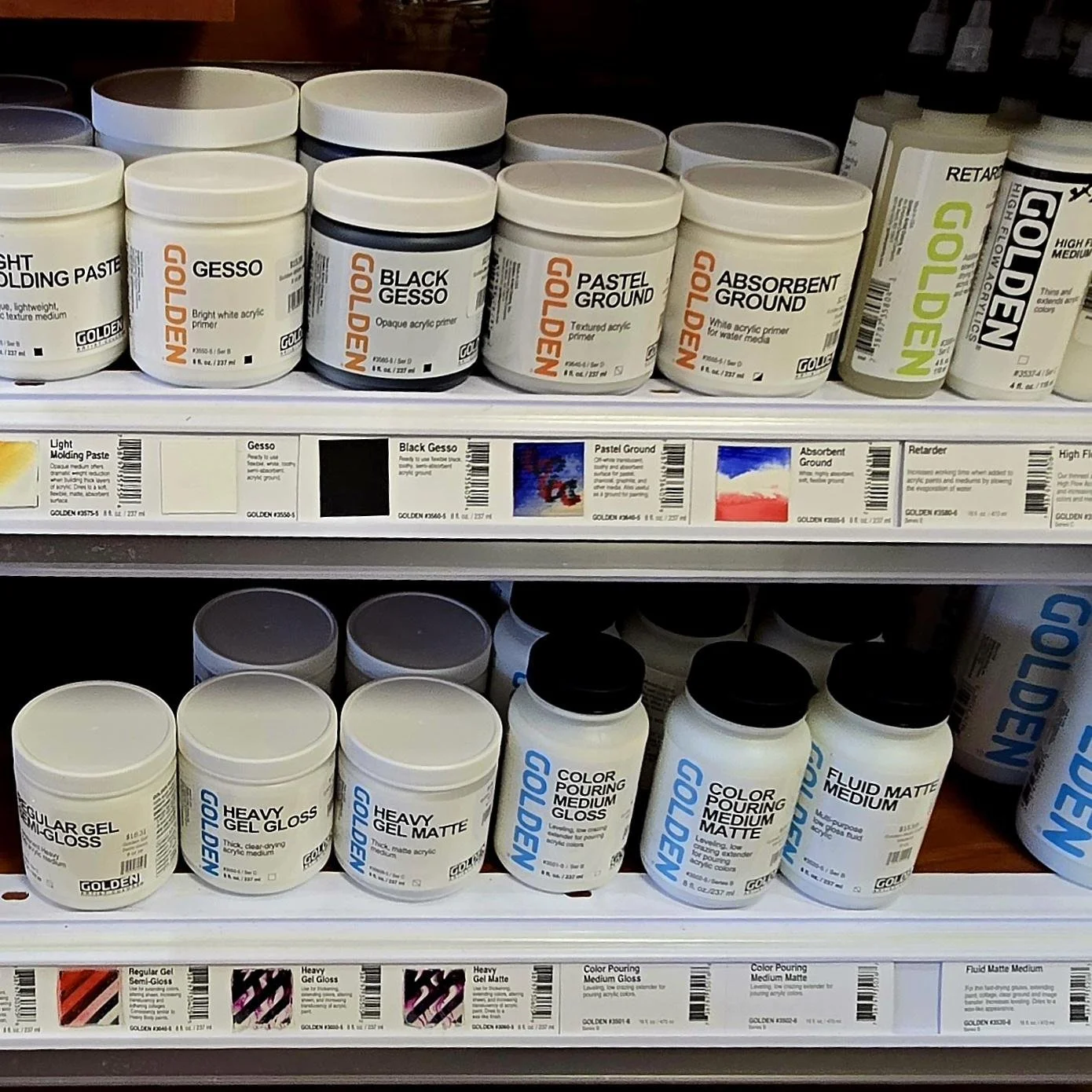 A large selection of acrylic mediums and gessos