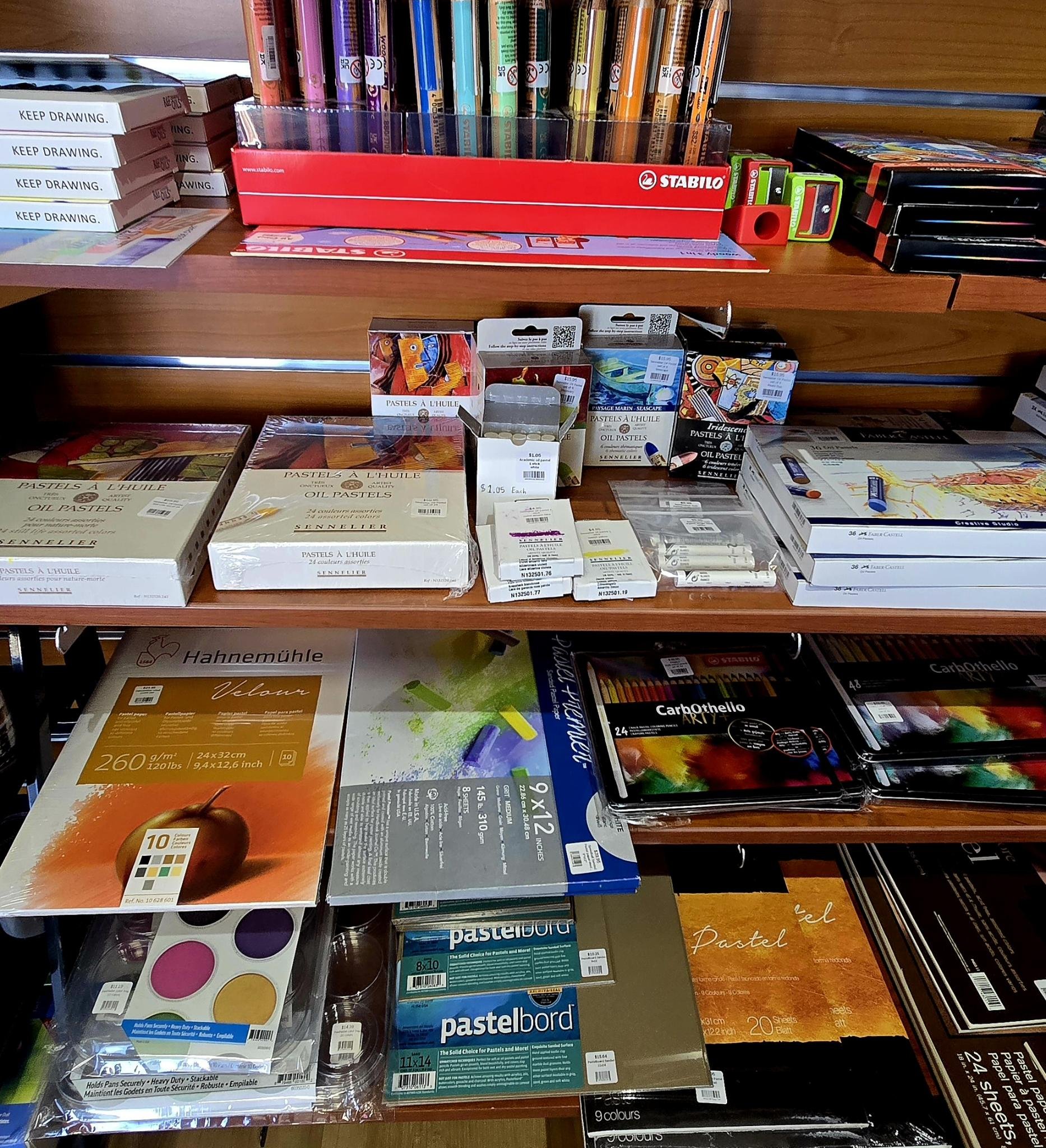 oil pastel sets and assorted pastel paper and surfaces