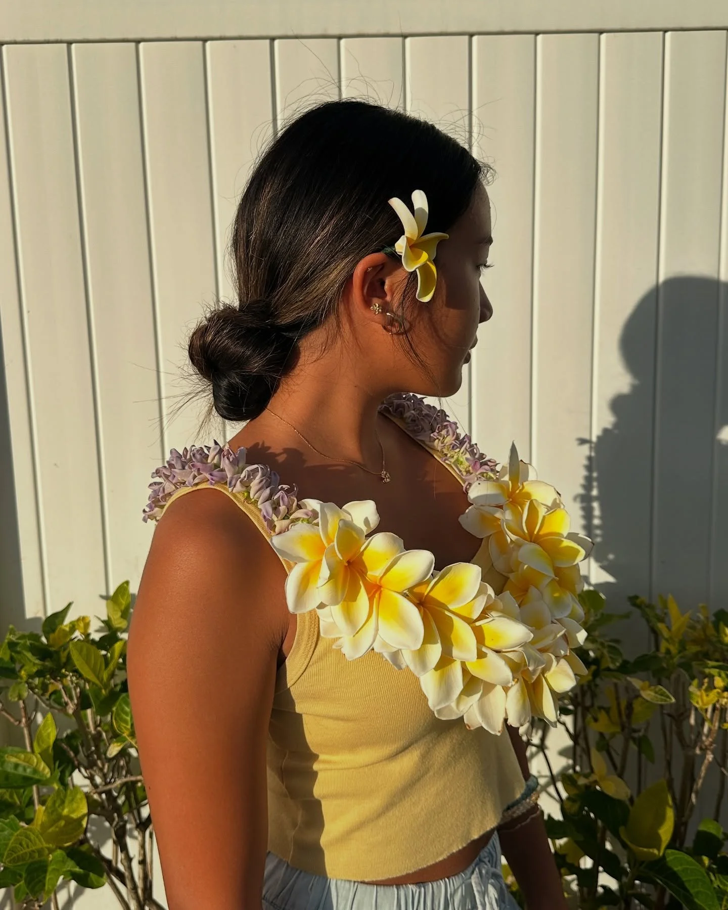 Crown flower + plumeria lei 💛💜