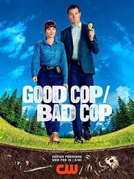 Poster for the TV show 'Good Cop / Bad Cop' featuring two characters walking outdoors under a blue sky, with the title and CW network logo at the bottom.