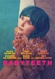 Cover of a magazine featuring a woman with short blue hair, wearing a floral top, with the title 'Babydteh' and names of featured actresses.