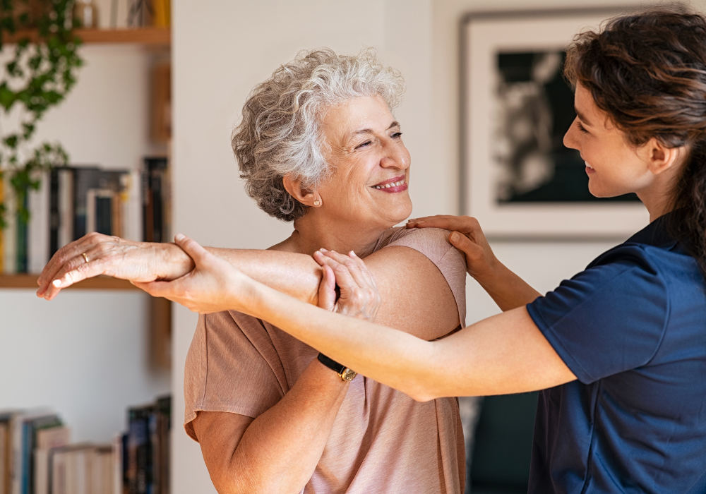 friendly physiotherapist arriving at a Canberra client’s home