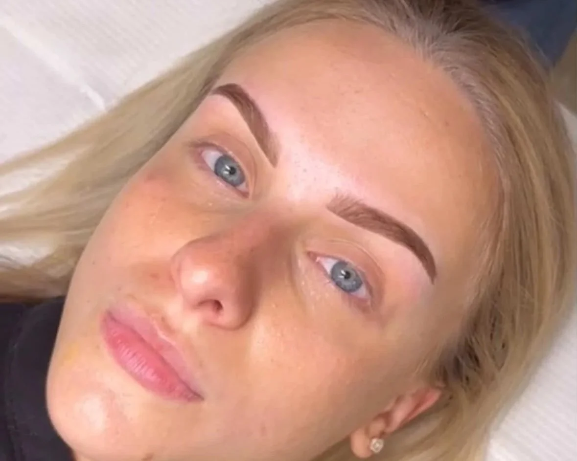 Salon customer with new long natural braids