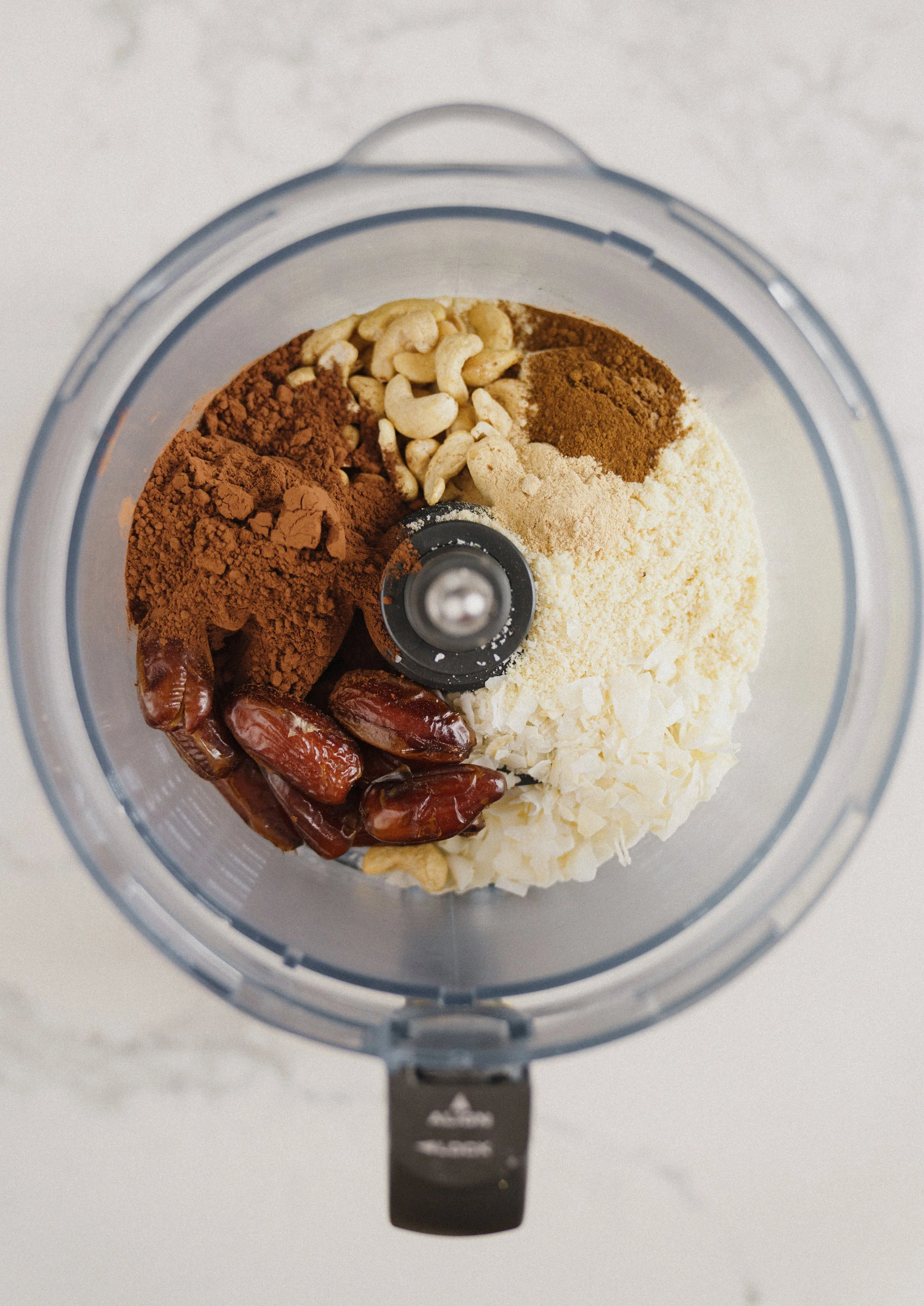 Close-up of unblended smoothie ingredients in a blender, symbolizing wellness copywriting and content supported by virtual assistant services for nutrition professionals.