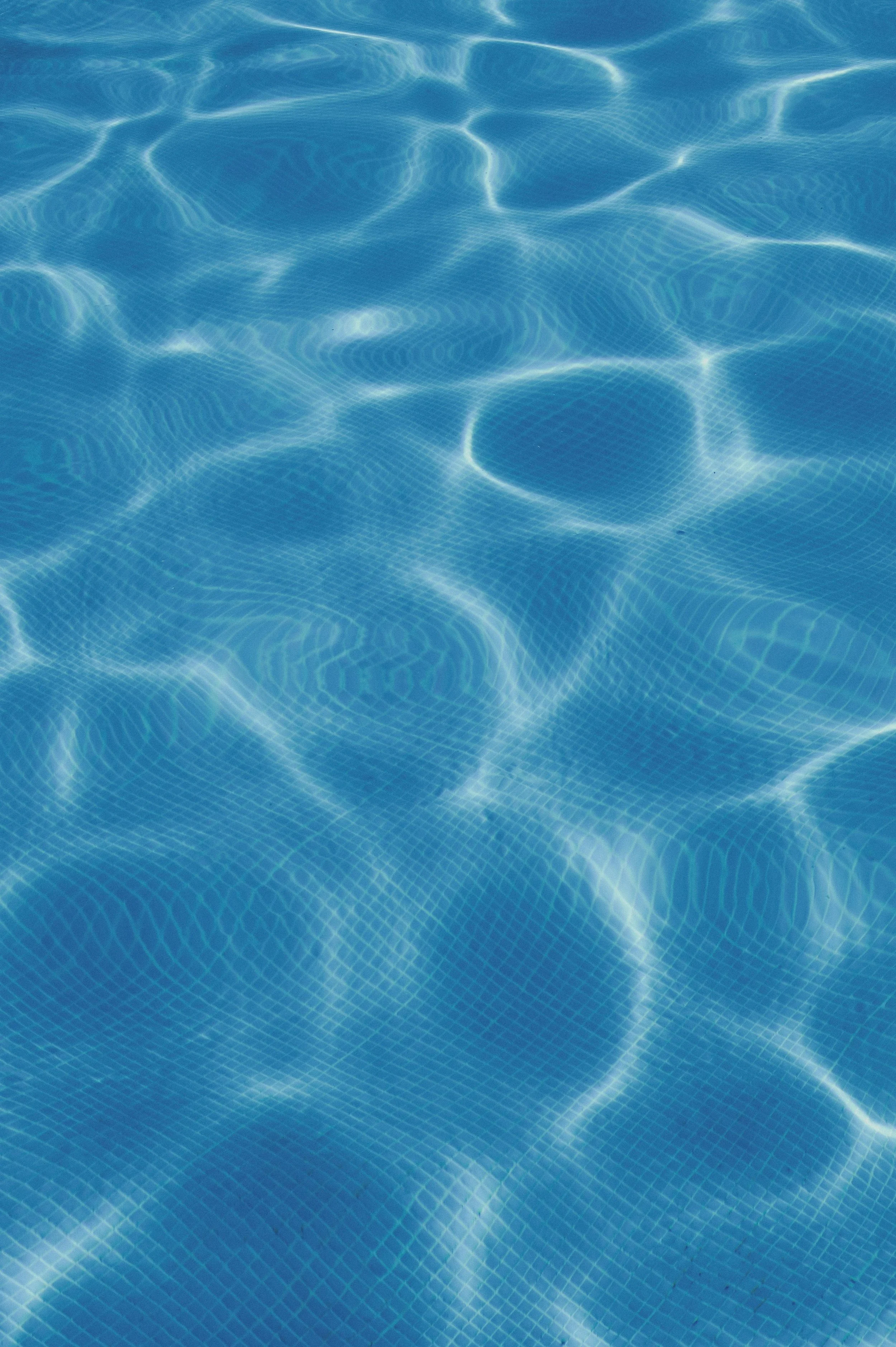 Clear rippled water lit from above, reflecting the refreshed, purified feel of a website after its SEO cleanse
