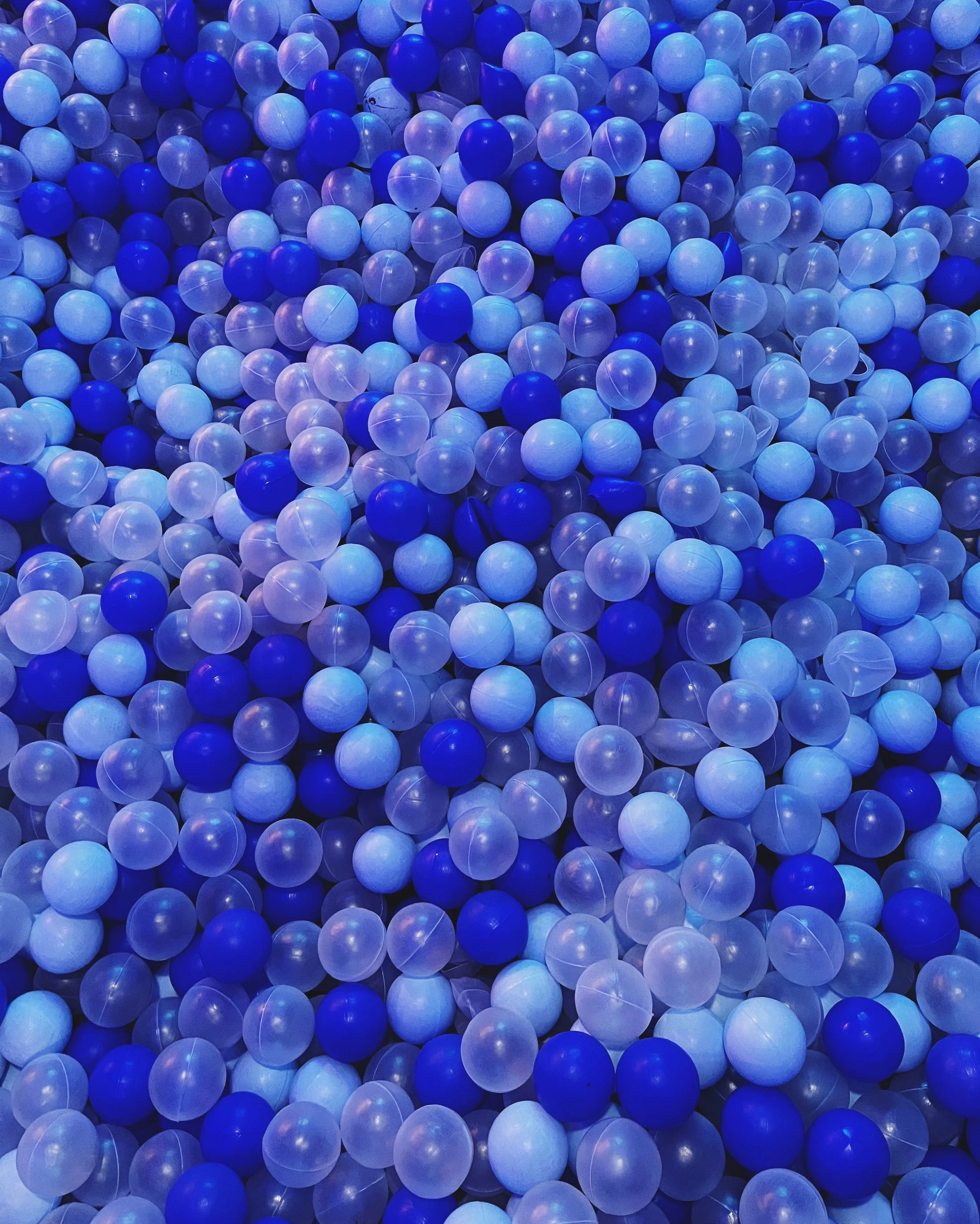 A dense field of blue and white balls, echoing the full, all-in nature of this partnership