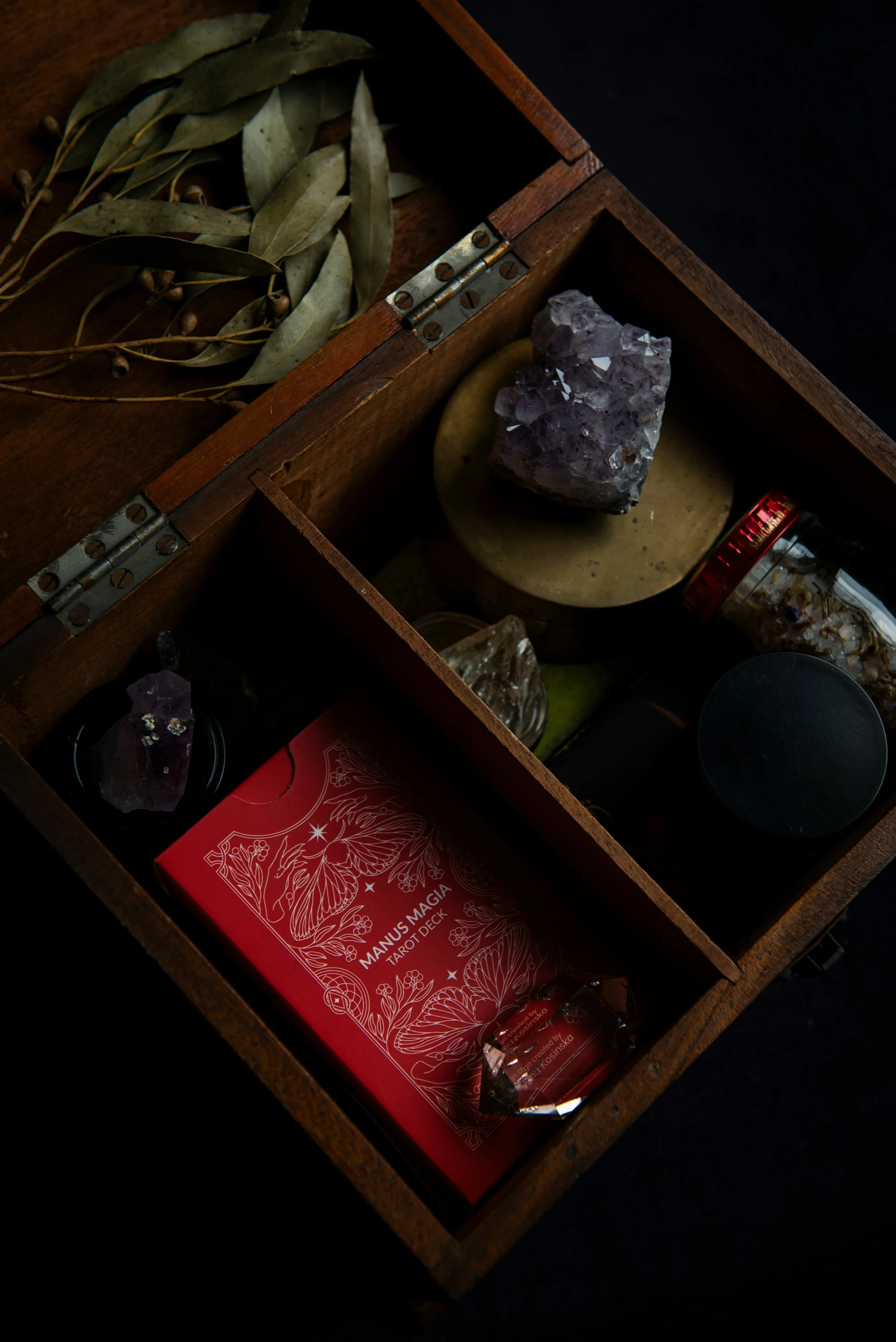 Tarot cards laid out on a wooden table, representing a healer’s spiritual and wellness practice, supported by virtual assistant services for digital product launches, wellness copywriting, content marketing, SEO, and admin.