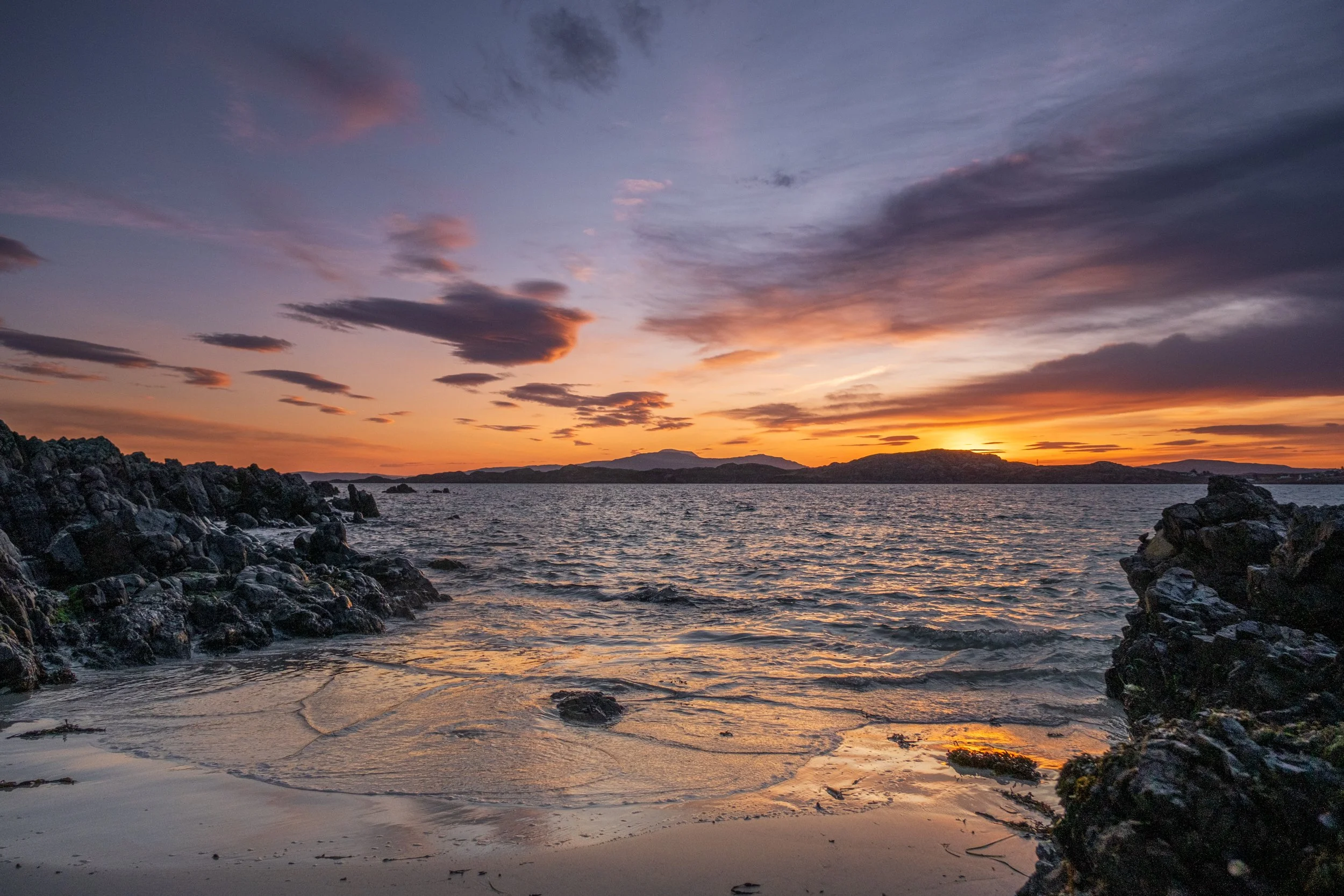 Sun rising over Mull, from Iona