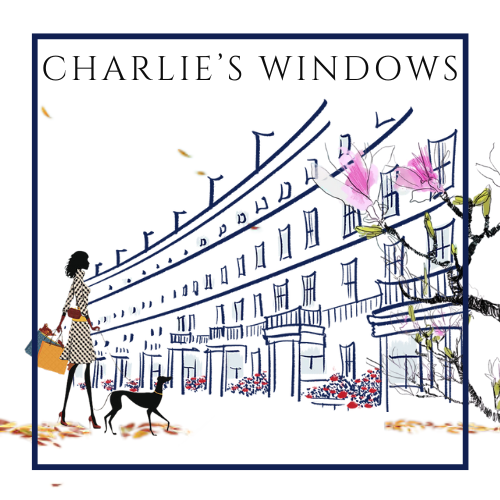 Illustration of a woman walking a dog past a building with the sign 'Charlie's Windows' and pink blossoms on a tree.