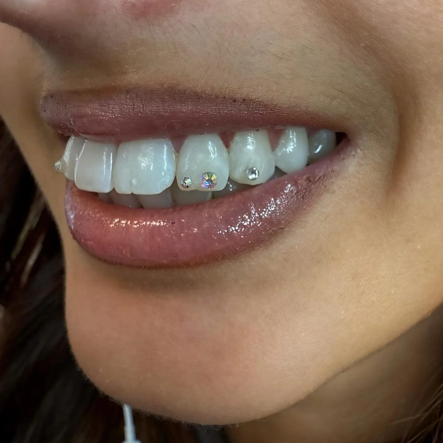 Added a tiny AB crystal next to one done a while ago! ✨💕
We have built up a cute little set of tooth gems over time 
📍Glasgow city centre