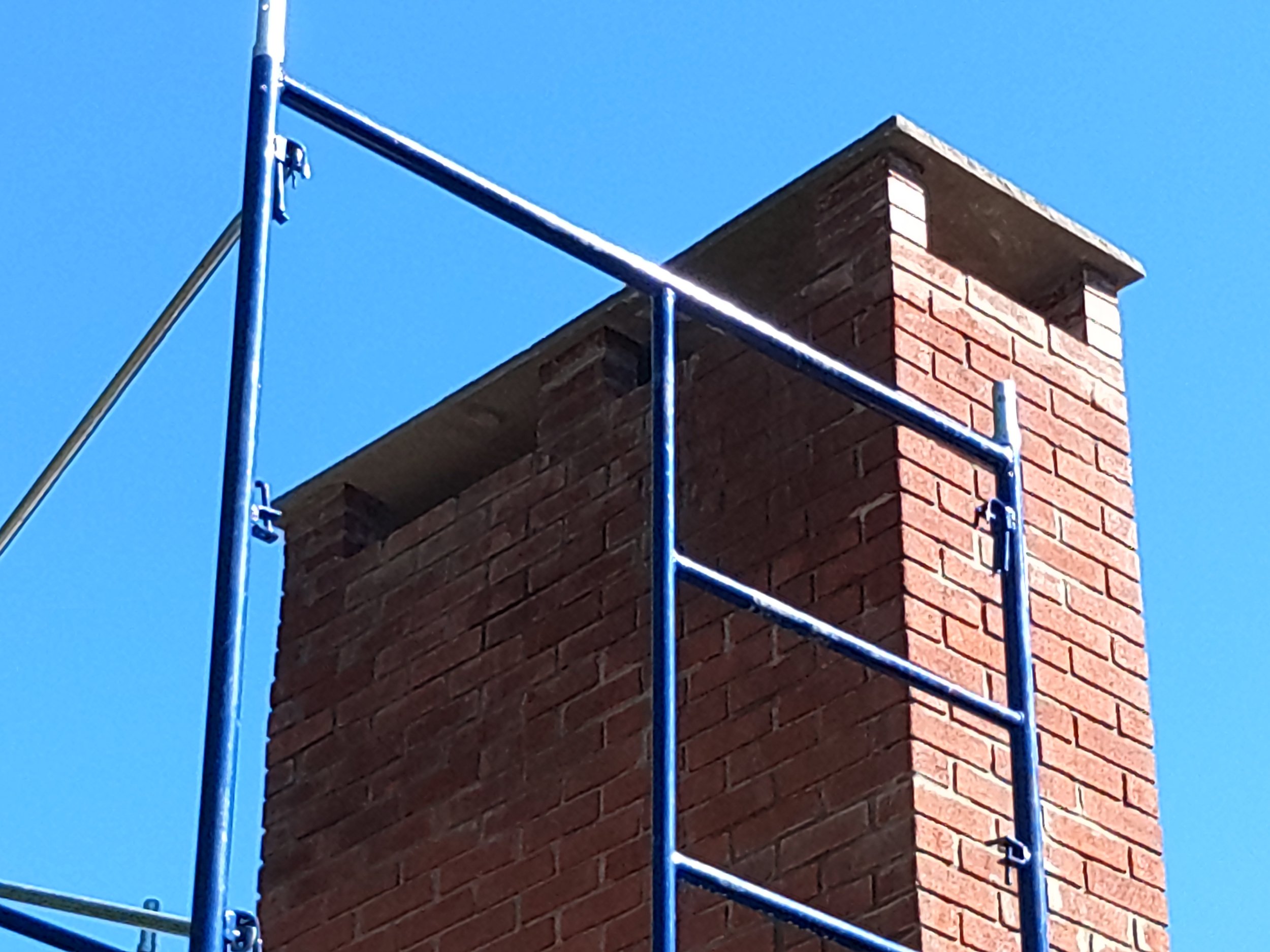 Brick chimney recently restored.