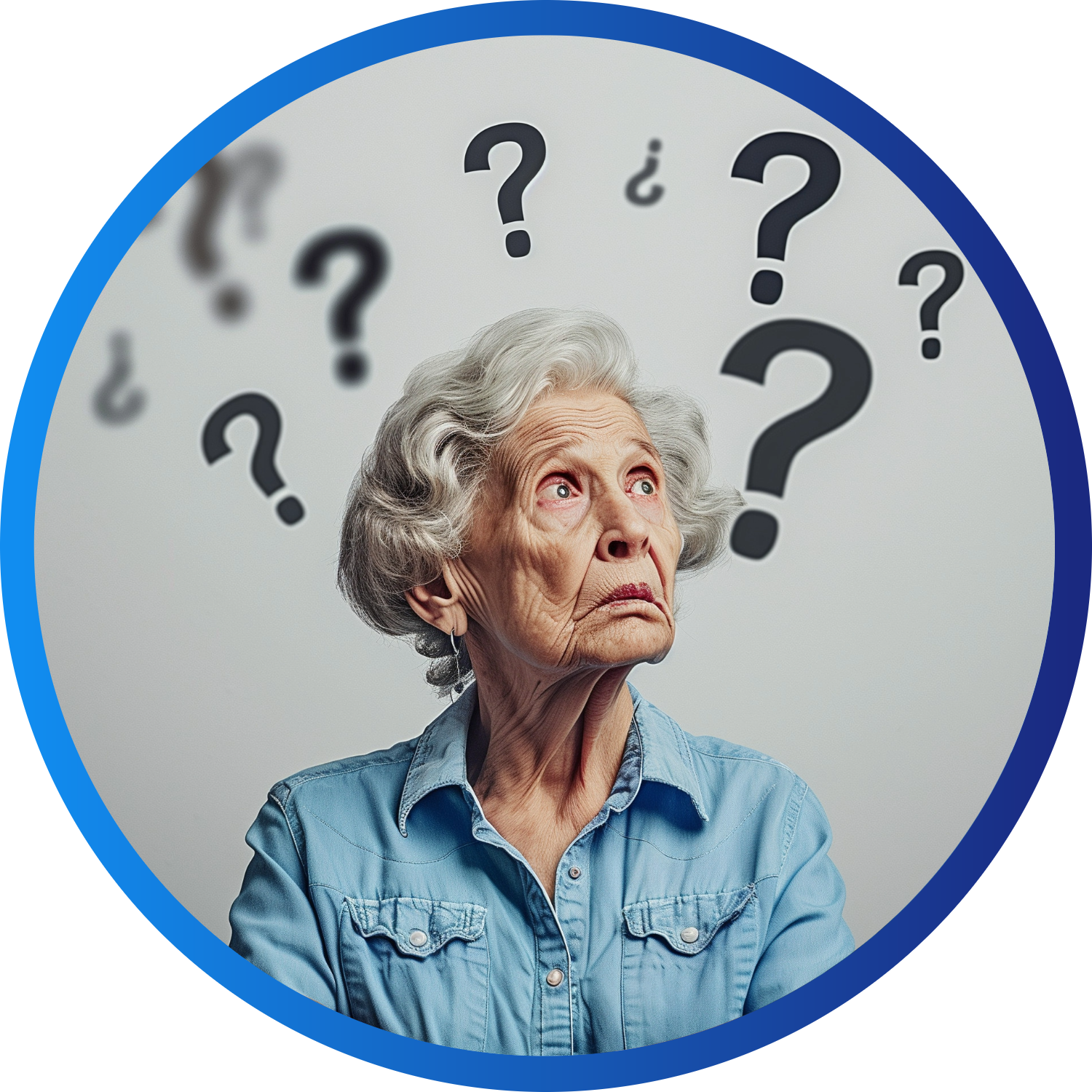 Close-up of a hand holding a small orange, rubbery, human ear model against a white background.