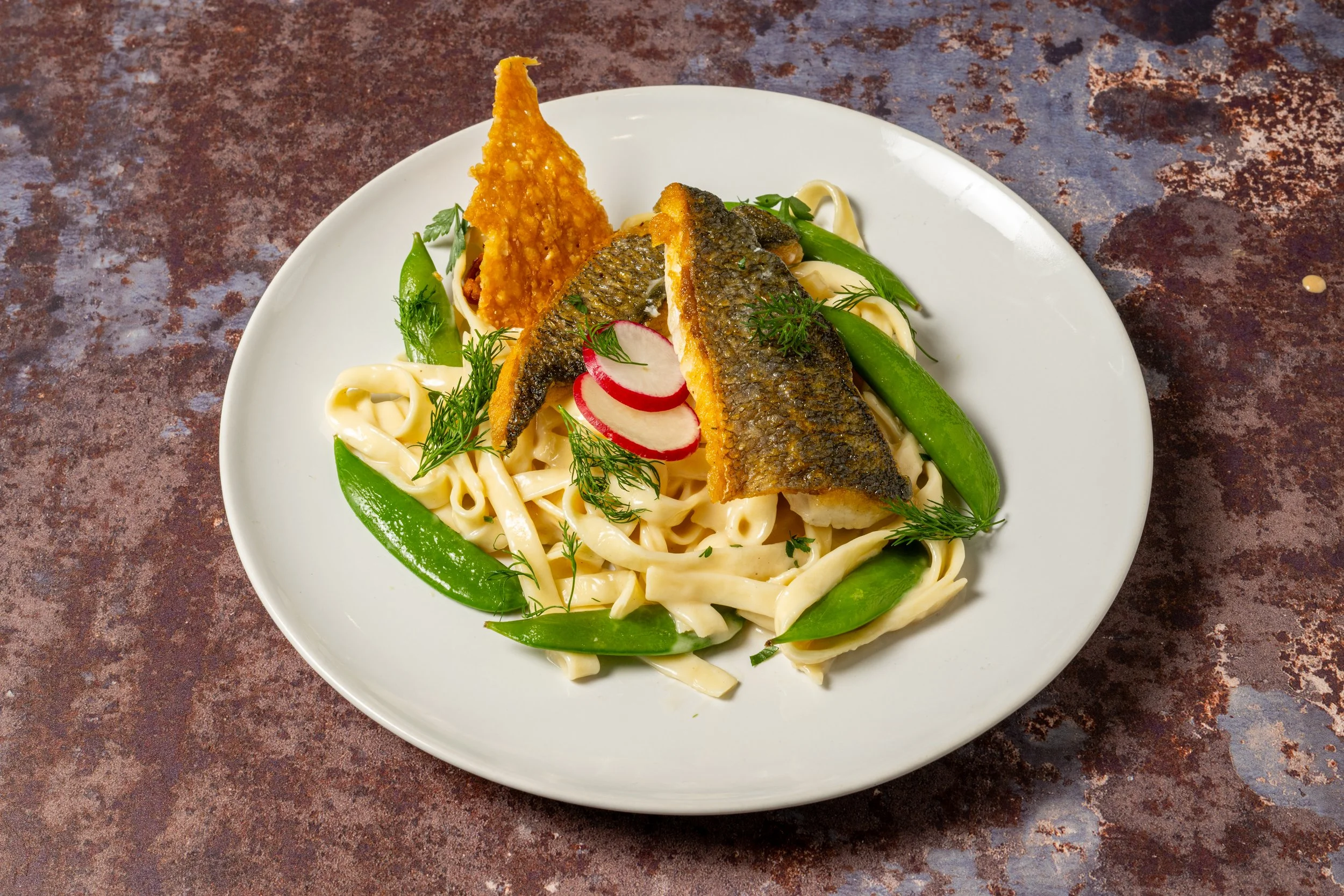 Professional English food photography showcasing a beautifully presented modern British dish. Creative commercial food photography capturing the detail, colour and presentation of English cuisine for chefs, restaurants, hotels, pubs and hospitality b