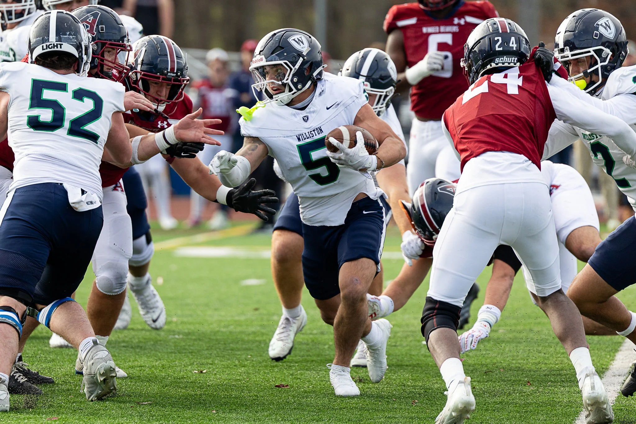 Senior running back Nate Ellis (5) evades Avon Old Farms defense during the NEPSAC Drew Gamere Bowl in Avon, CT, on November 15, 2025.