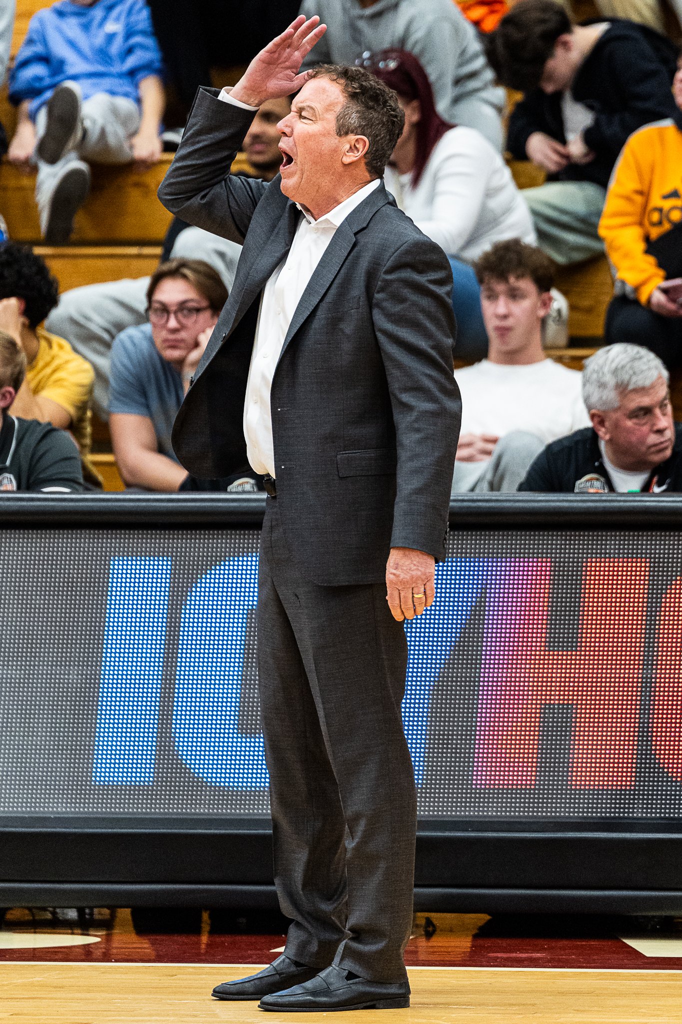 Spire Academy (OH) Head Coach Kevin Boyle directs his team from the sideline of the PANINI Hoophall Classic in Springfield, MA during a game against Sunrise Christian Academy on January 19, 2025.