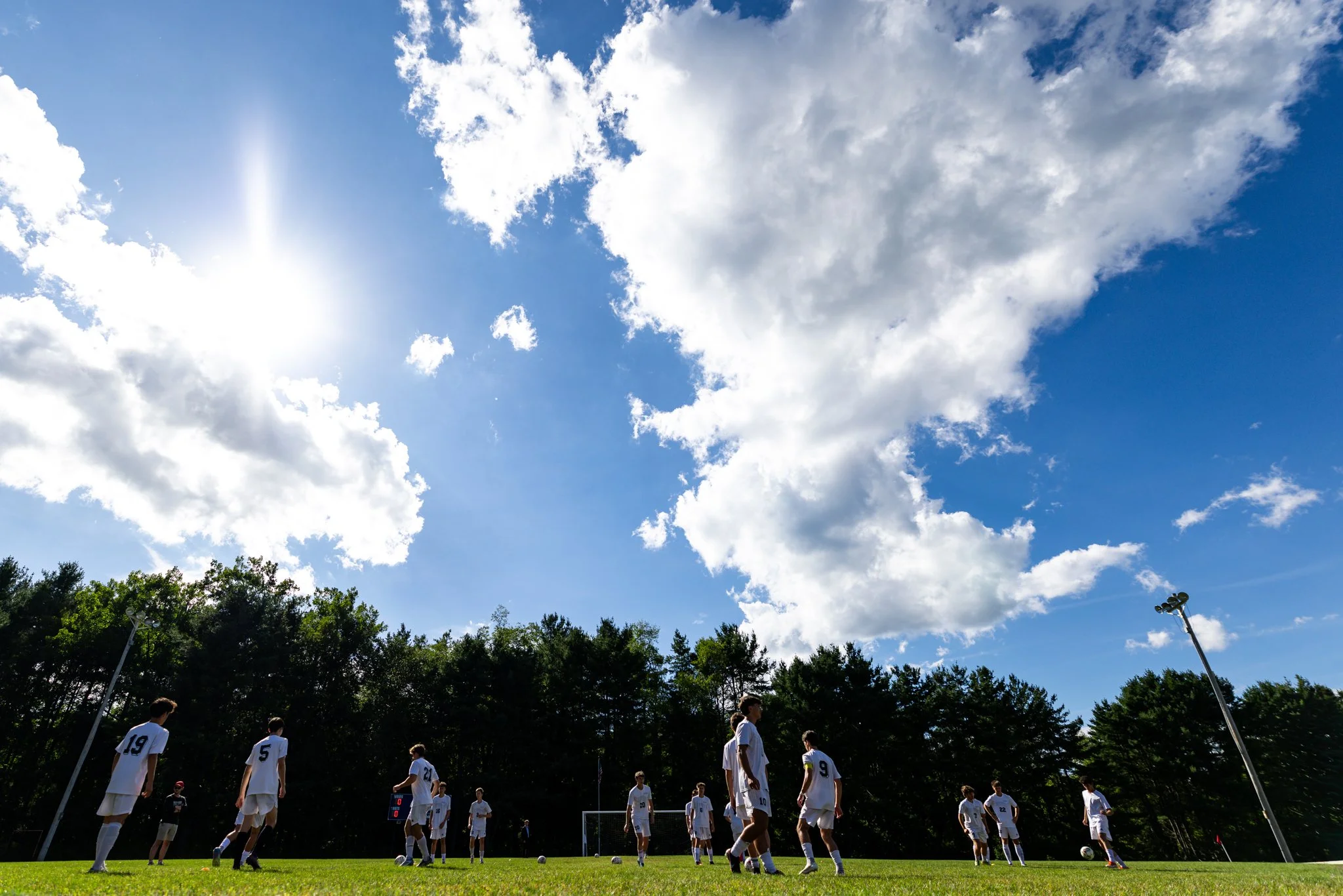 Hampshire boys varsity soccer team warms up beneath the afternoon sun prior to the game against Wahconah on Thursday, September 10th at Wahconah Regional High School in Dalton, MA. 