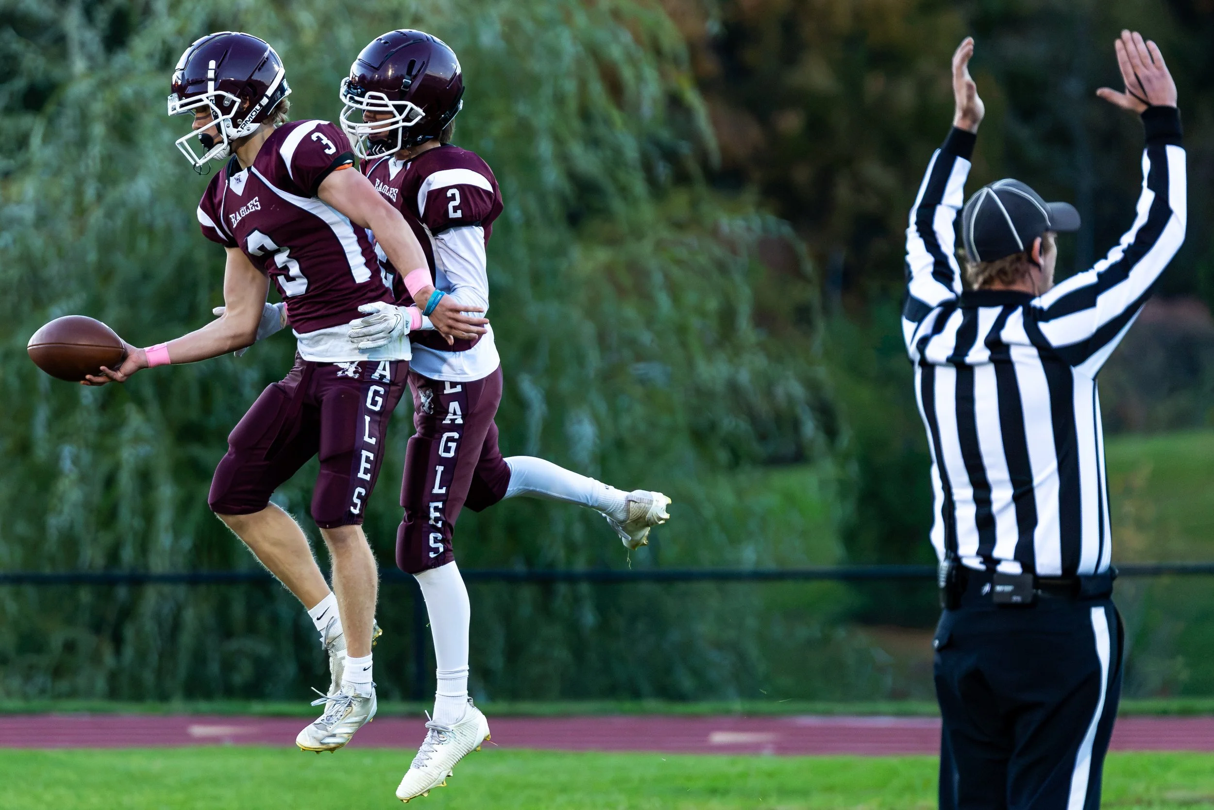 Junior quarterback Patrick Larson (left) celebrates a rushing touchdown with teammate Chase Cannon-Smith (right) during the game against Holyoke on October 9th at the Mountain View School. 