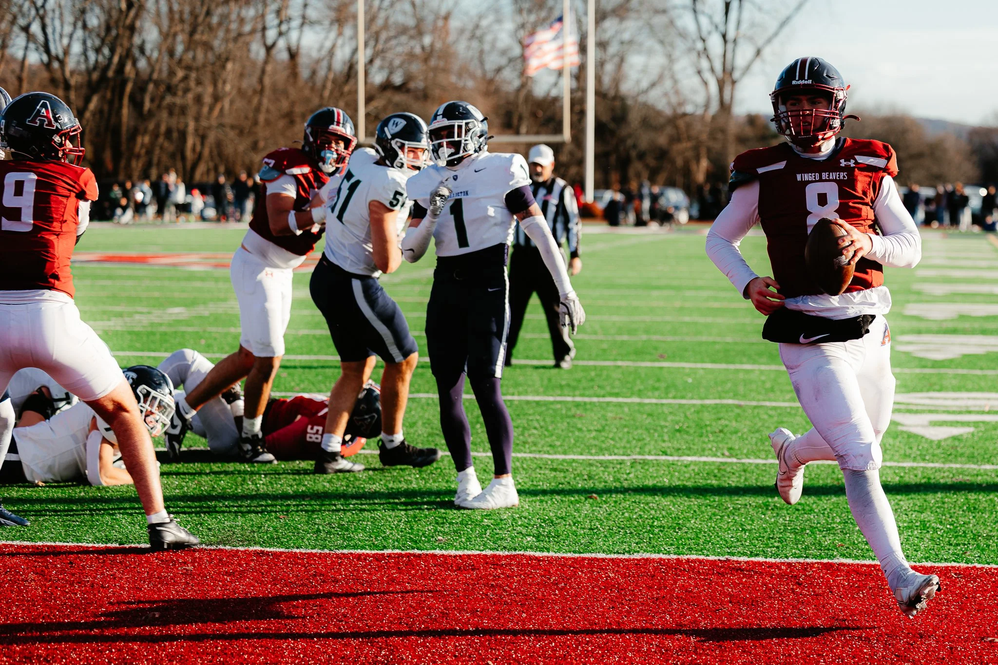 Boston Globe | Avon Old Farms quarterback Matthew Baer scores one of his three rushing touchdowns during a 35-21 victory over visiting Williston in the Drew Gamere Bowl to determine the Class A NEPSAC champions on Nov. 15, 2025.