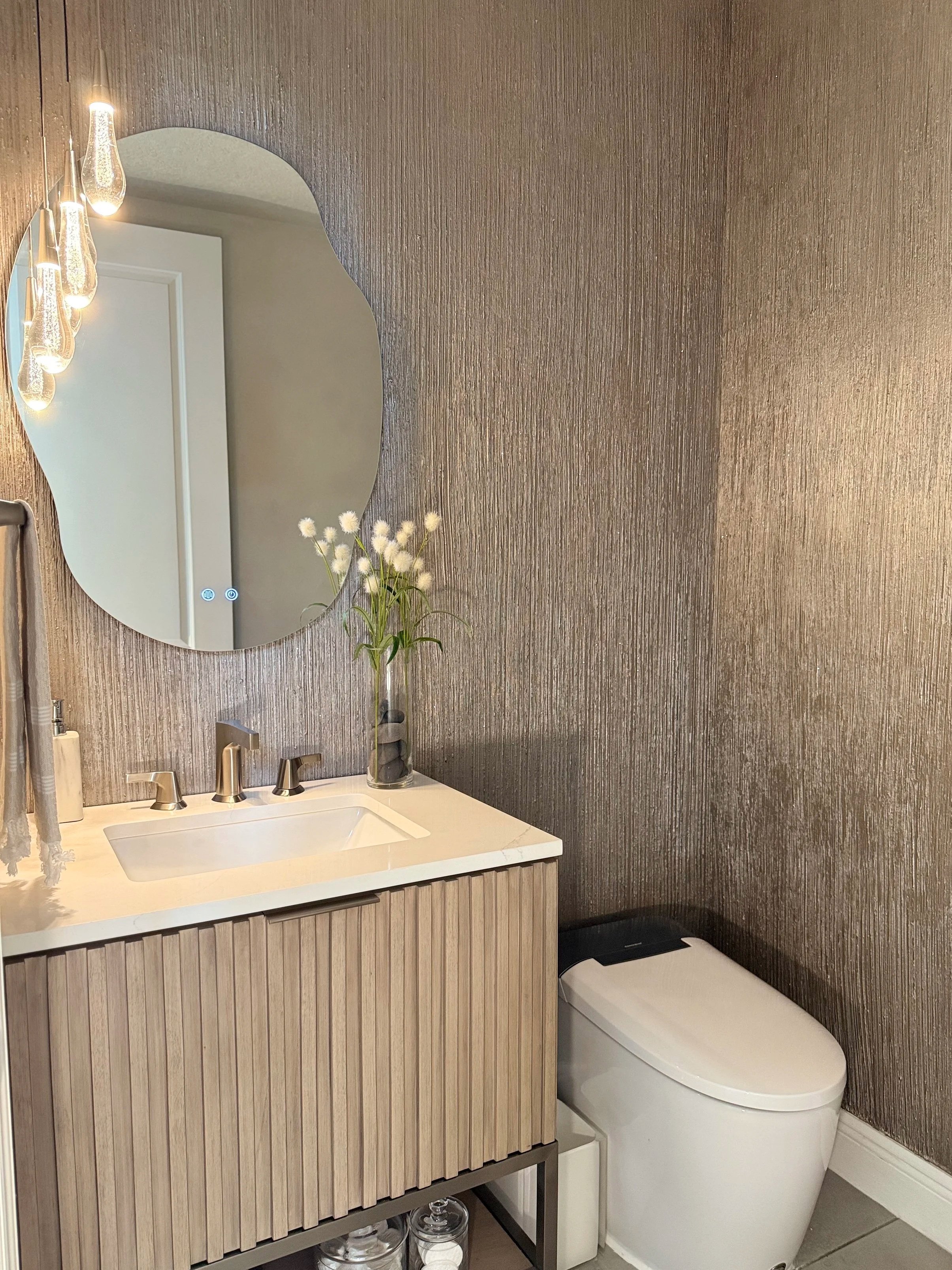 Graham & Co. Interiors Powder Room Design Serving Tampa, St. Petersburg, Sarasota, Orlando, and Beyond.