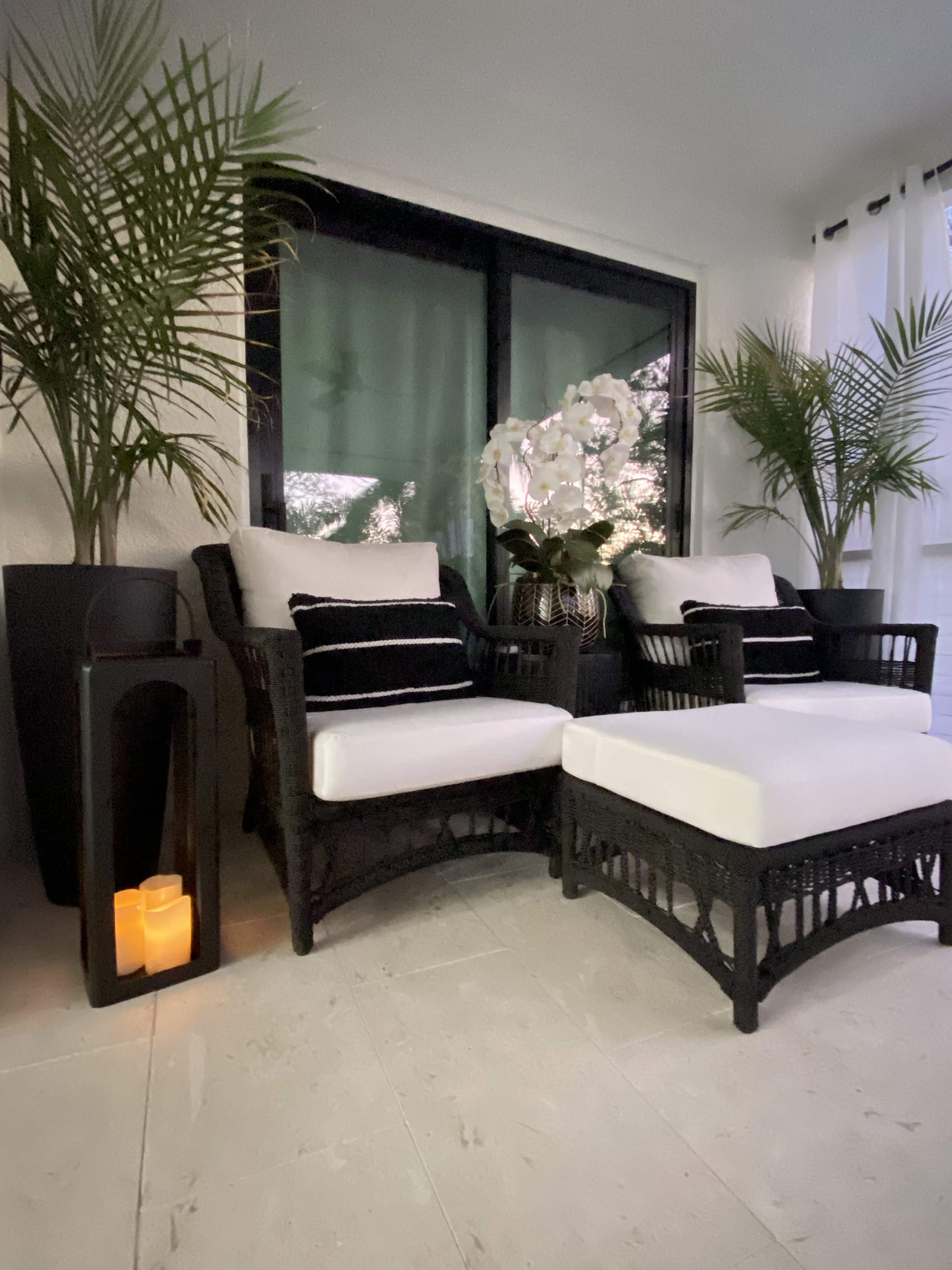 Refined outdoor living space designed by Graham & Co. Interiors in Tampa Bay, creating a relaxing setting for everyday living and entertaining.