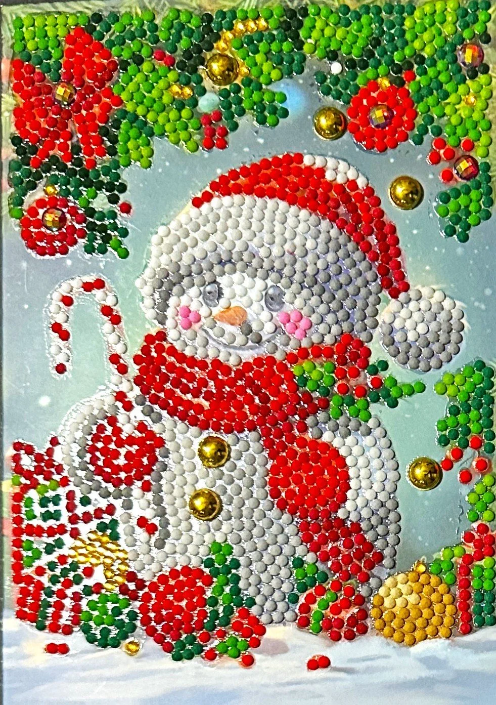 Snowman Holding a Candy Cane