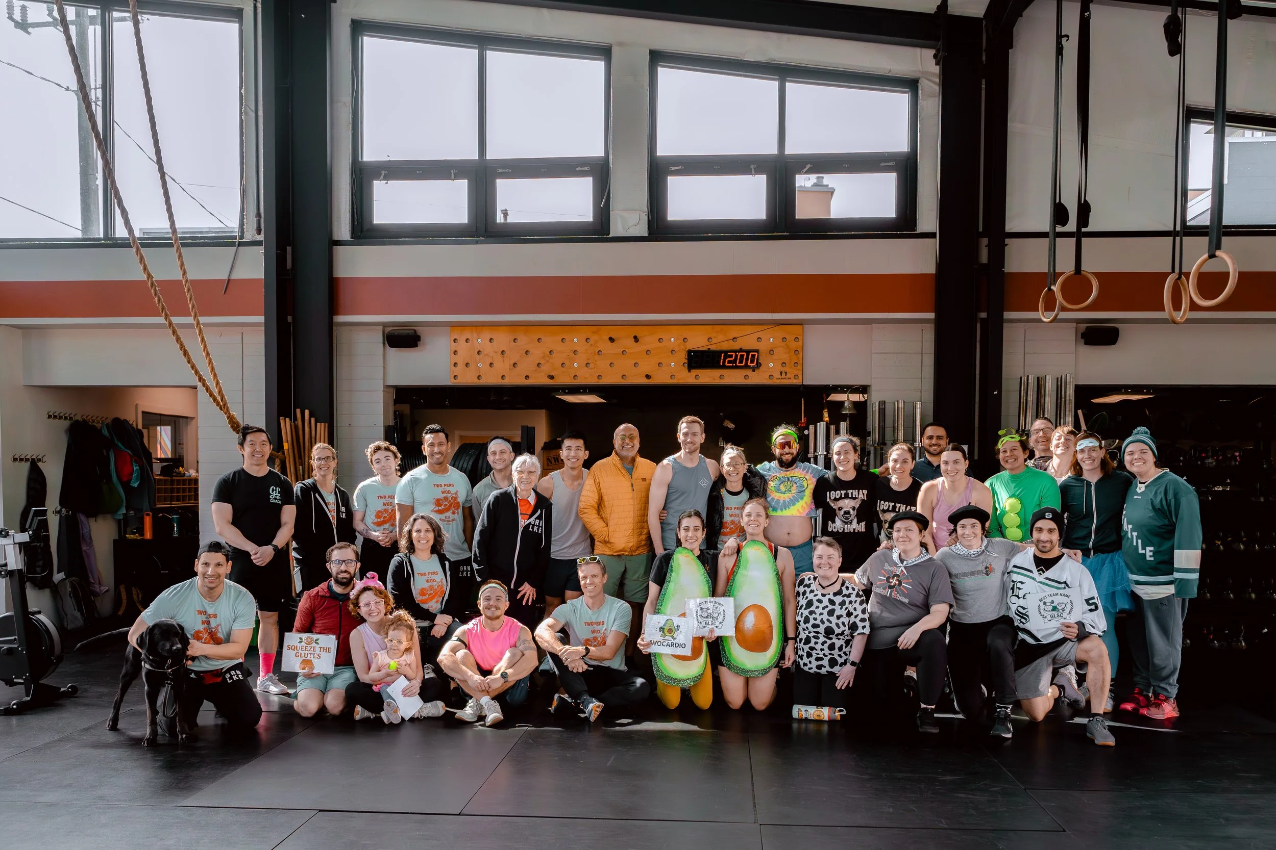 Team photo after a partner workout challenge at Green Lake Strength and Conditioning in Seattle, Washington.