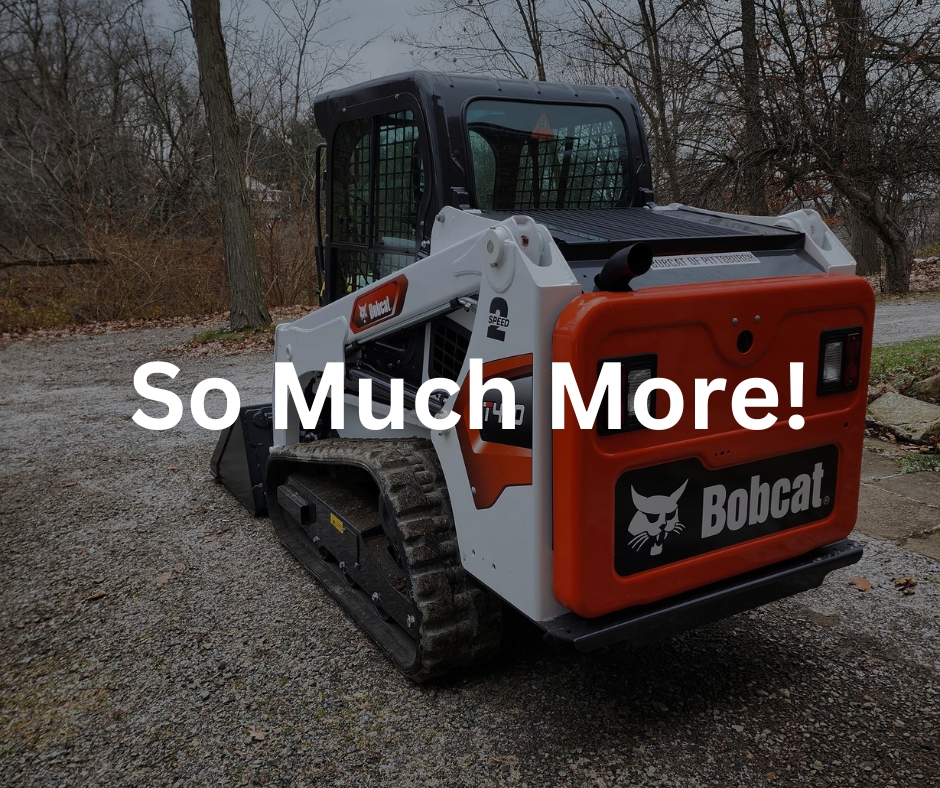 A Bobcat compact track loader parked outdoors on a gravel surface, with trees and overcast sky in the background.