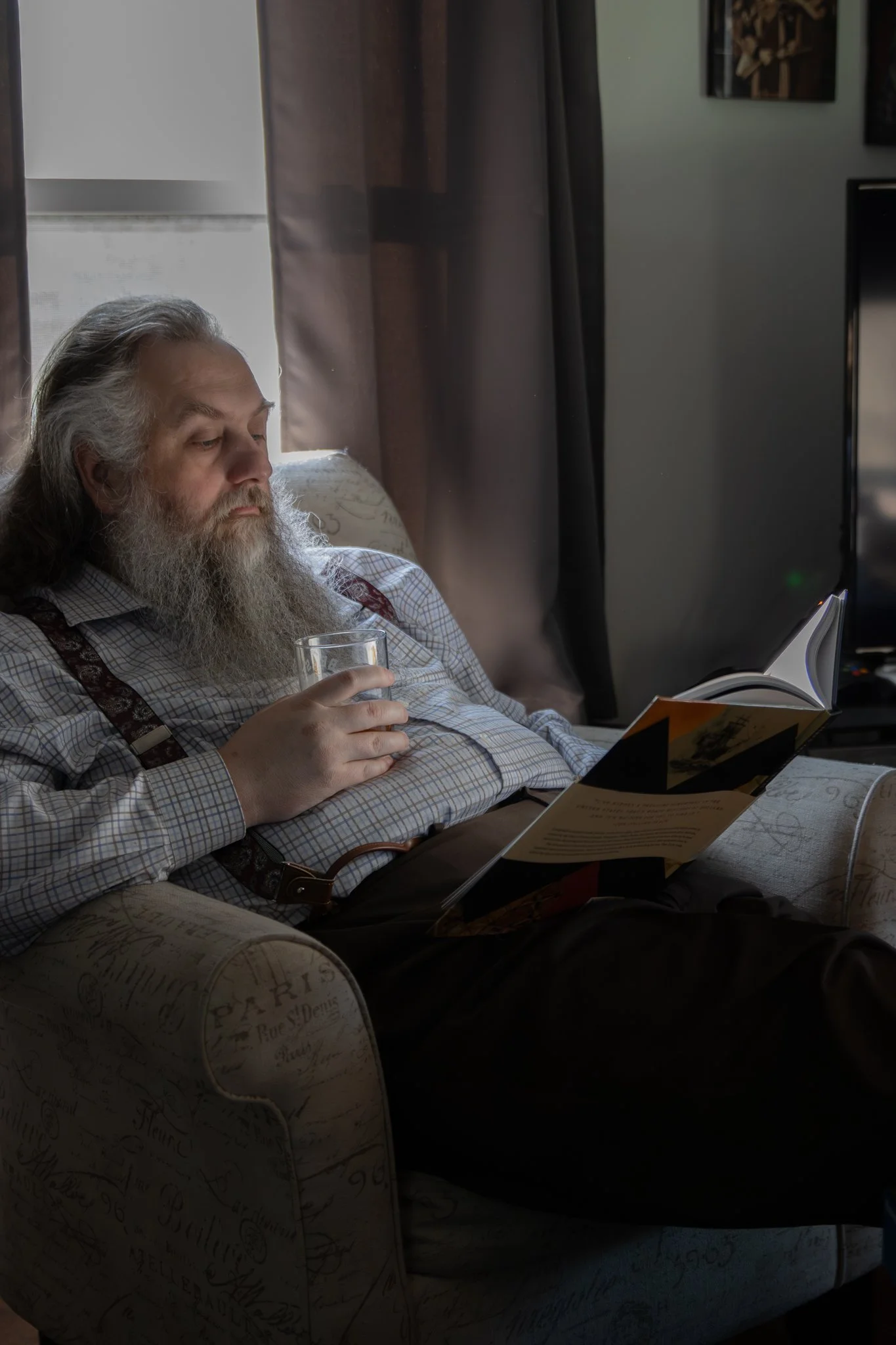 Relaxing with a book and drink after work