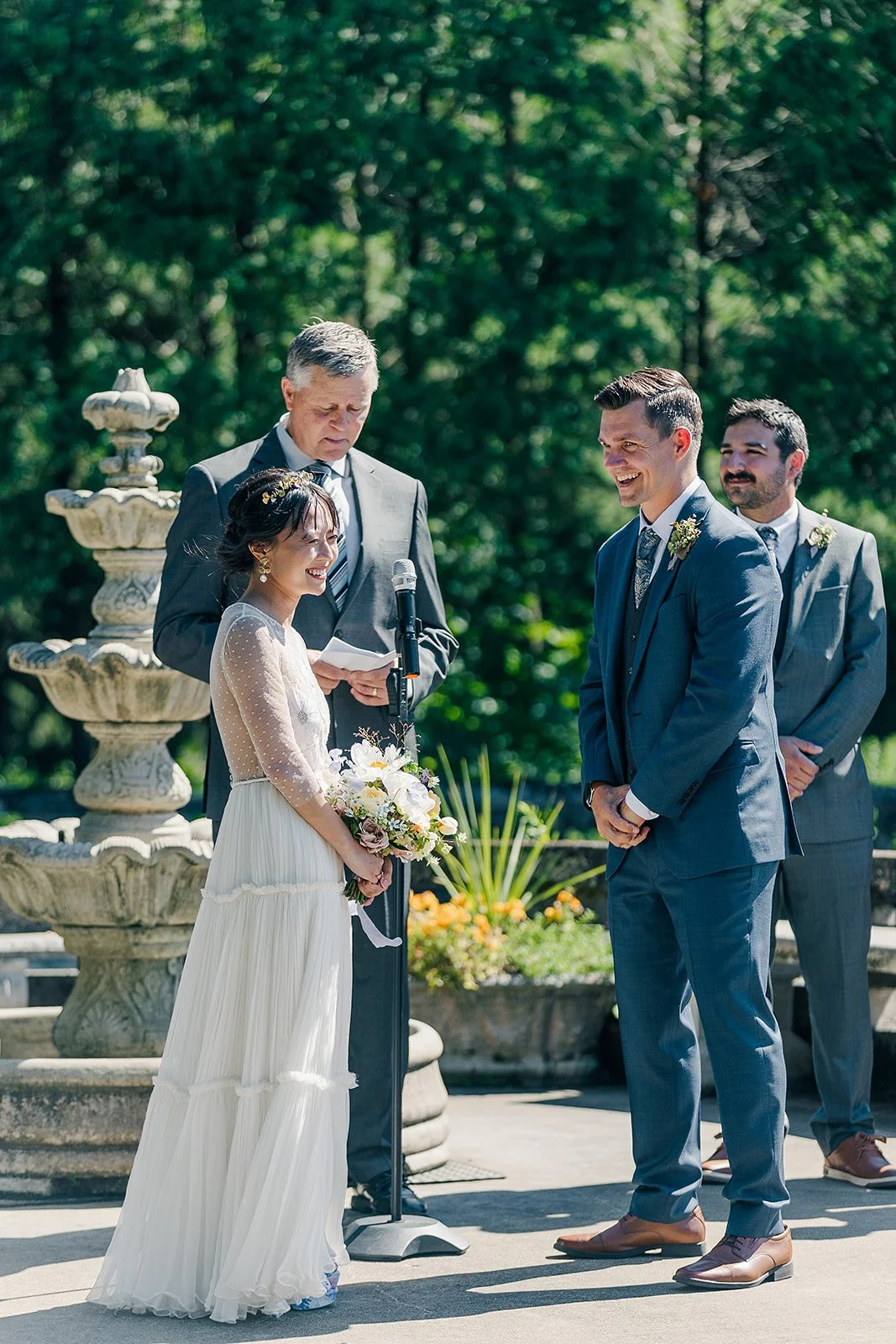 wedding-ceremony-by-fountain-gardens-felt-mansion.jpg