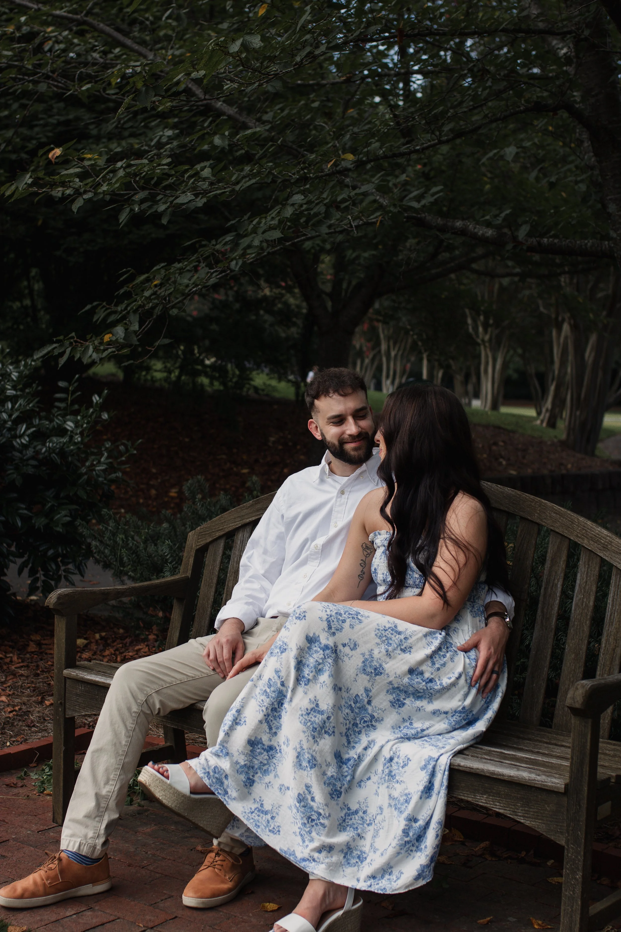 Birmingham wedding photographer captures couples engagement photos outdoors in garden setting
