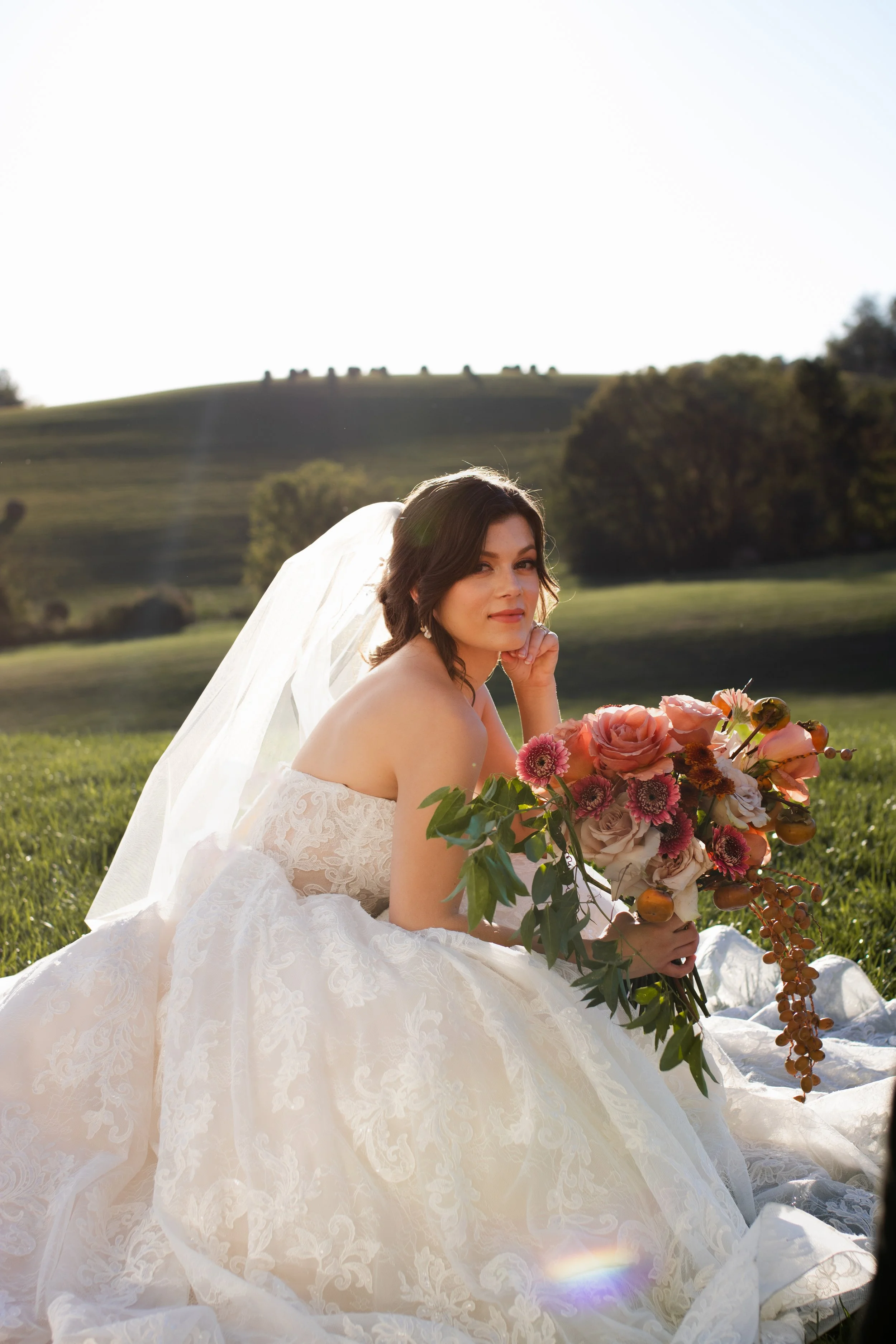 dreamy outdoor bridal portrait taken at golden hour at rolling hills venue