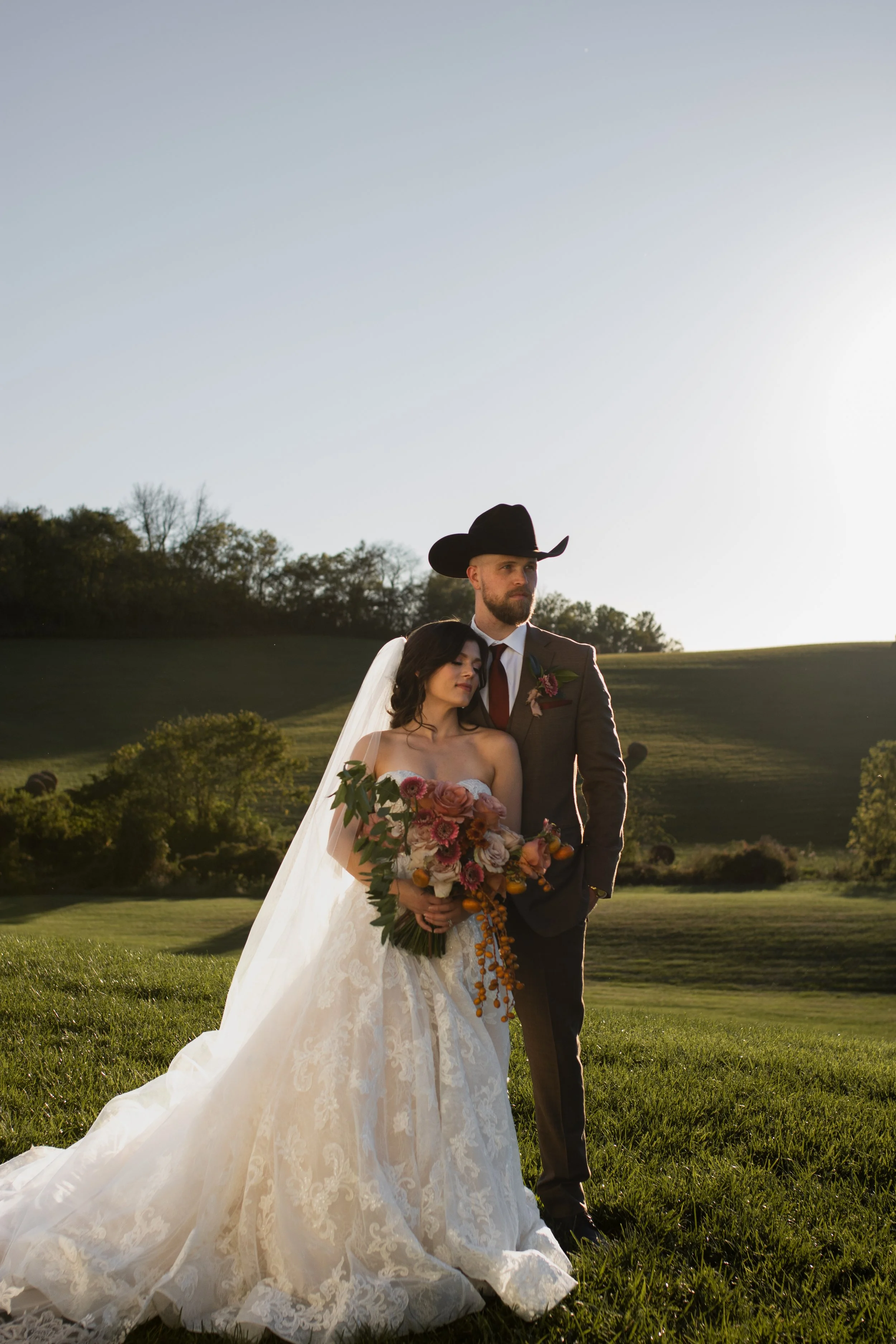 Alabama wedding photographer captures bride and groom portraits at golden hour outdoors at fall wedding