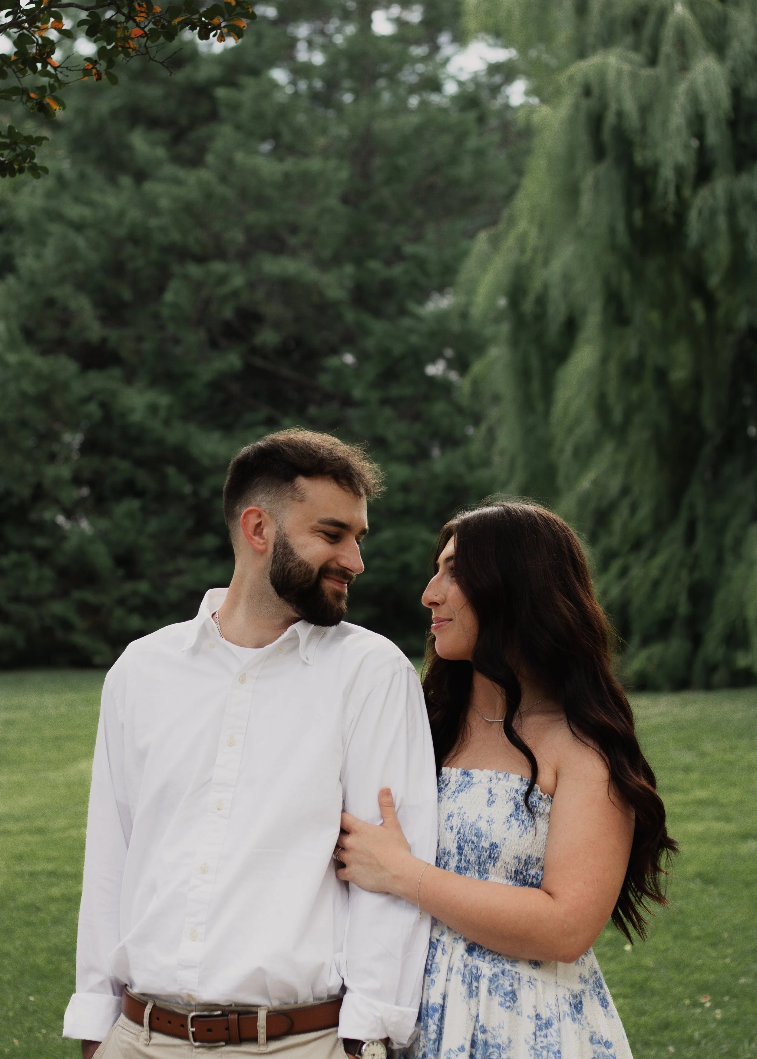 Birmingham photographer captures engagement photos of couple outside in garden setting