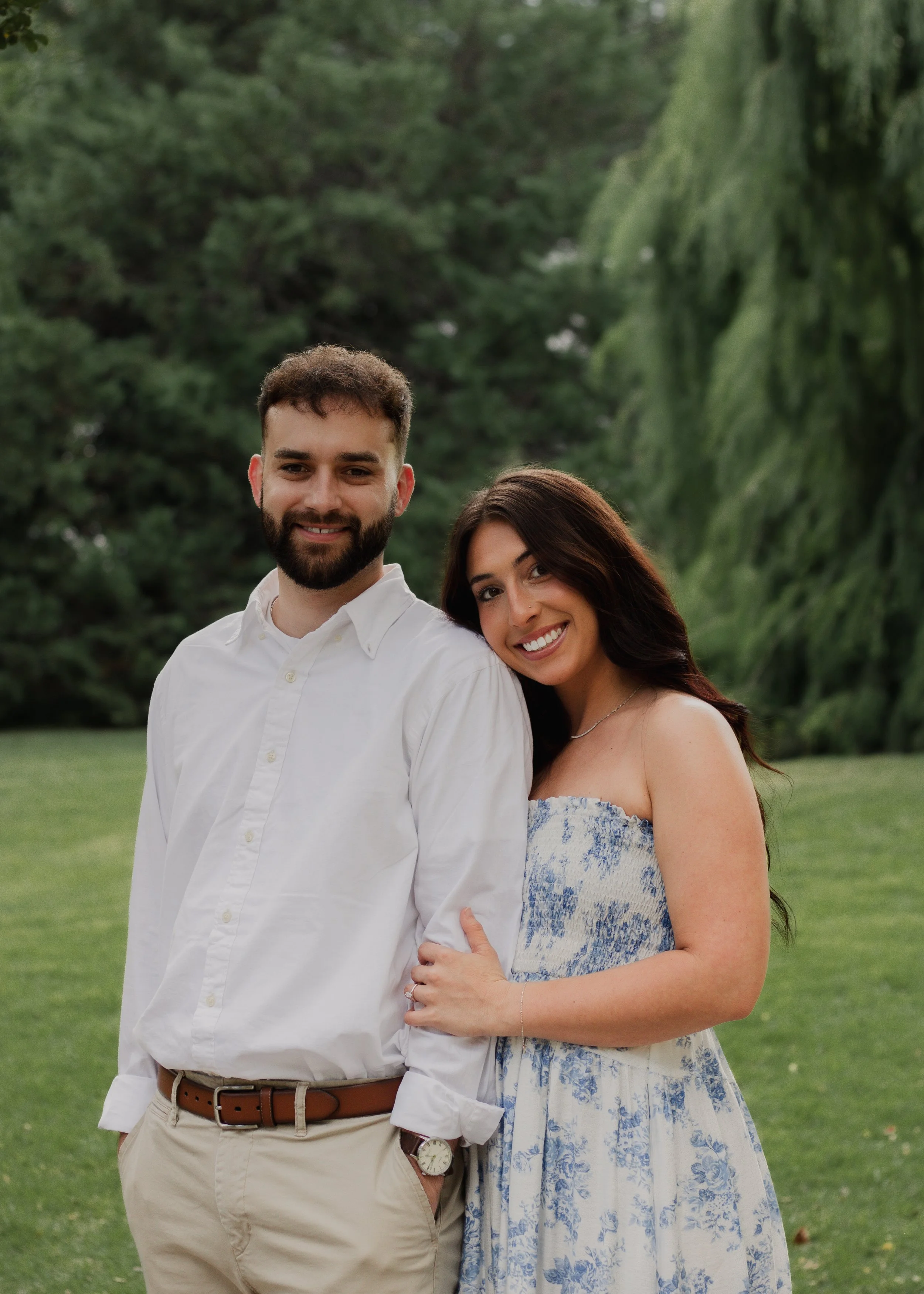 Alabama wedding photographer captures traditional engagement portrait of couple outdoors in romantic garden setting
