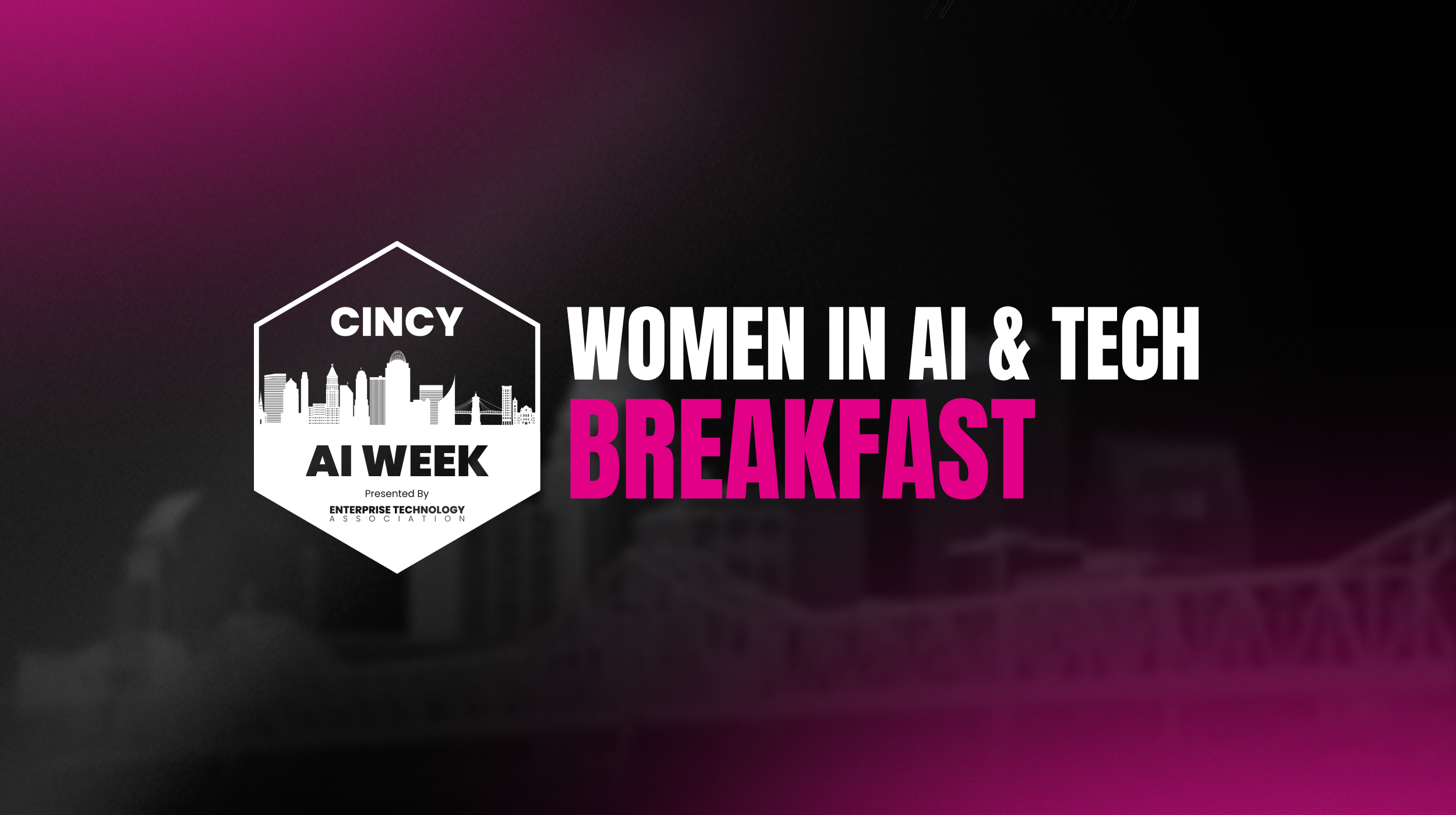 A man with curly dark hair, glasses, and a beard looking off to the side