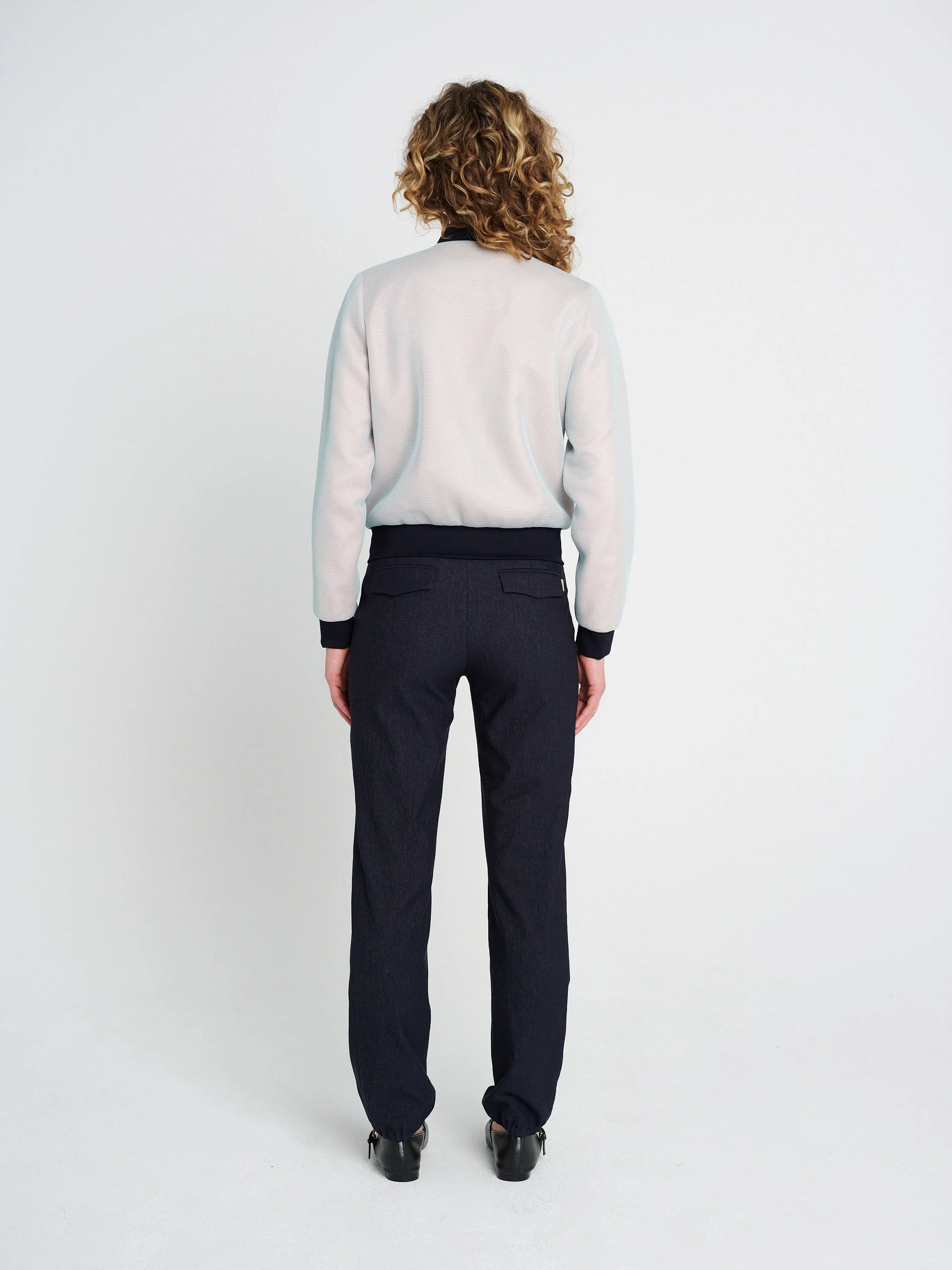 Blouson aus Netzstoff in türkis und rosa, Reißverschlusstaschen und Strickbündchen am Ärmel