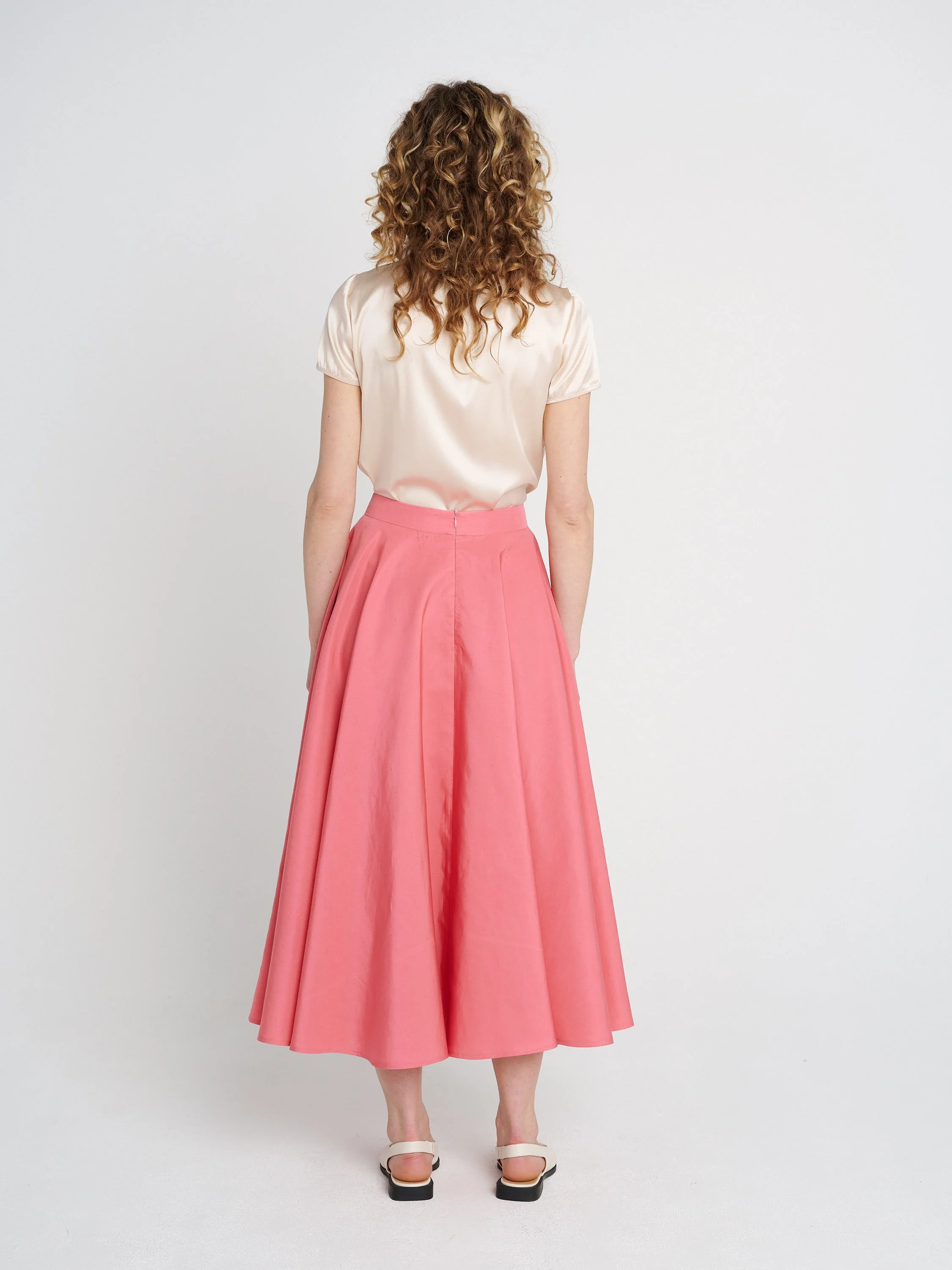 Weich fallender Rock für Hochzeitsgäste oder Anlässe mit Taschen und Bündchen, midi.